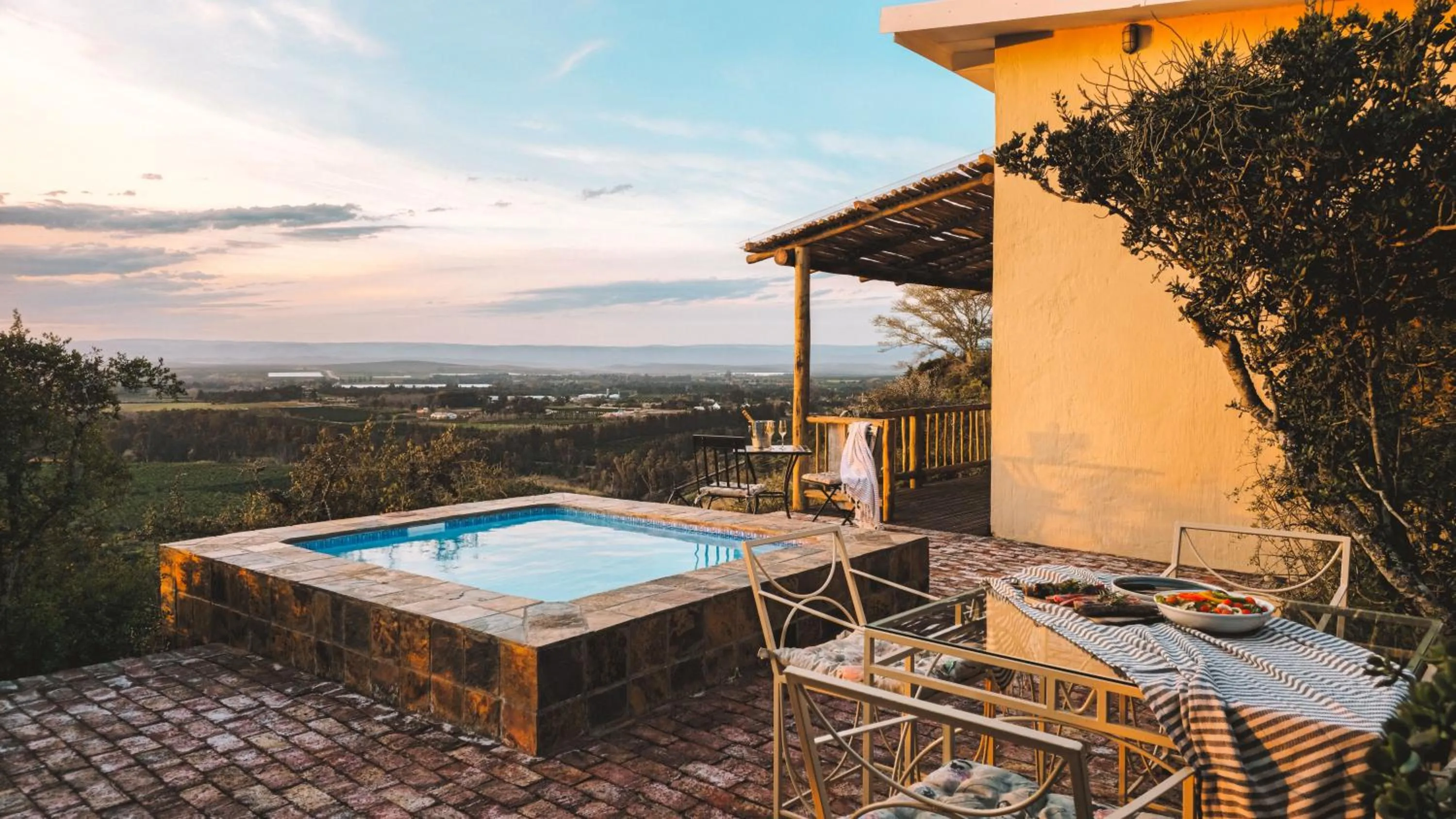 Pool view in Hitgeheim Garden Cottages
