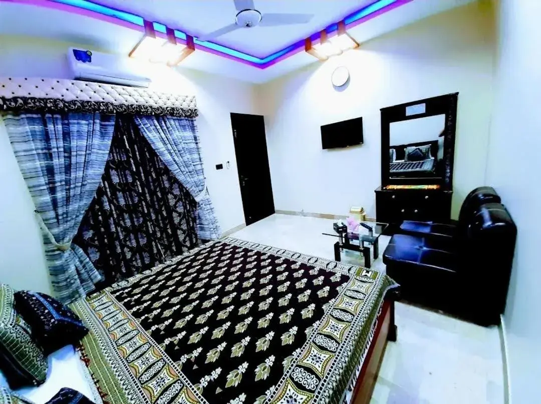 Bed in Galaxy Inn Guest House Bed in Galaxy Inn Guest House