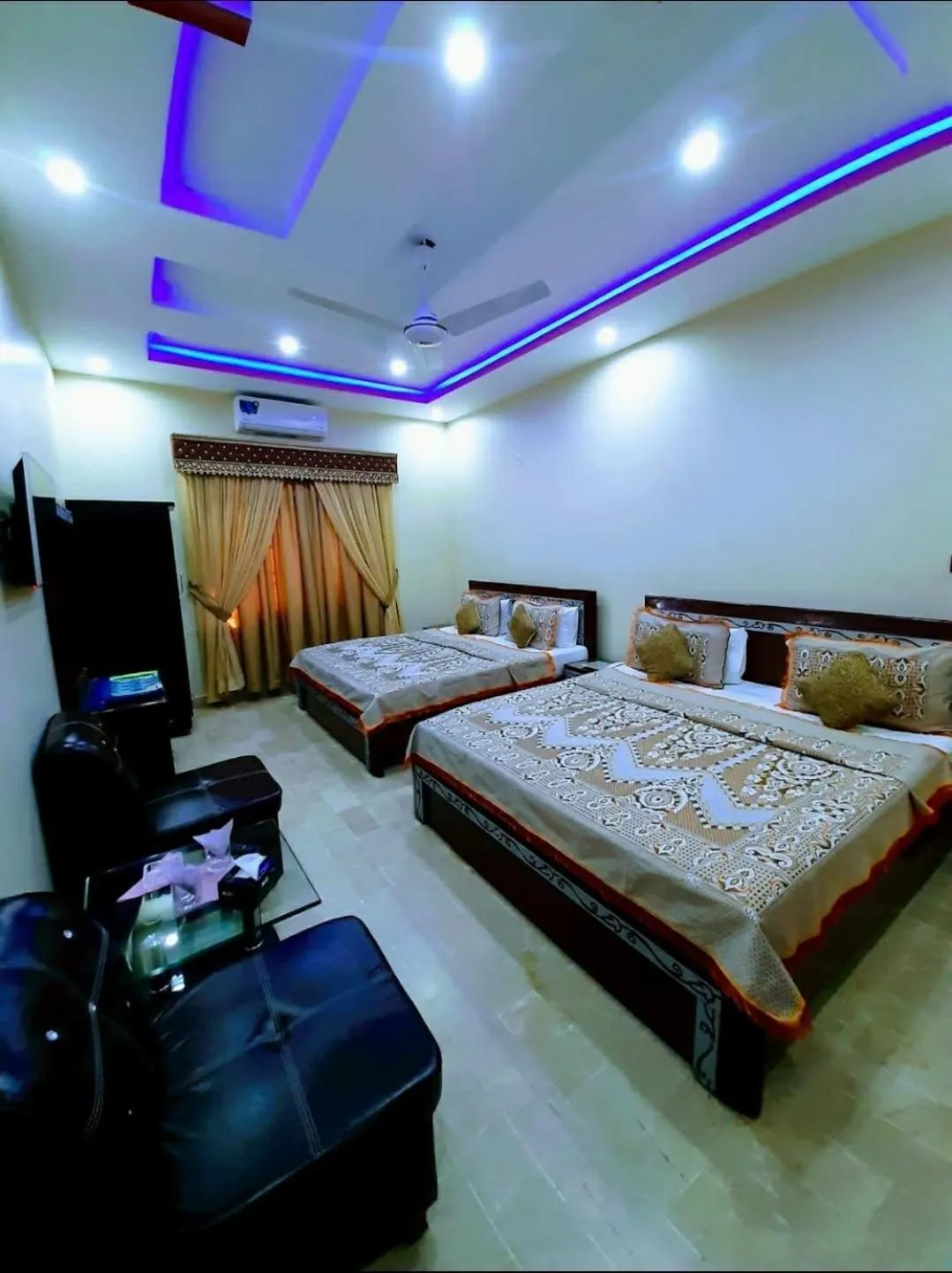 Bed in Galaxy Inn Guest House