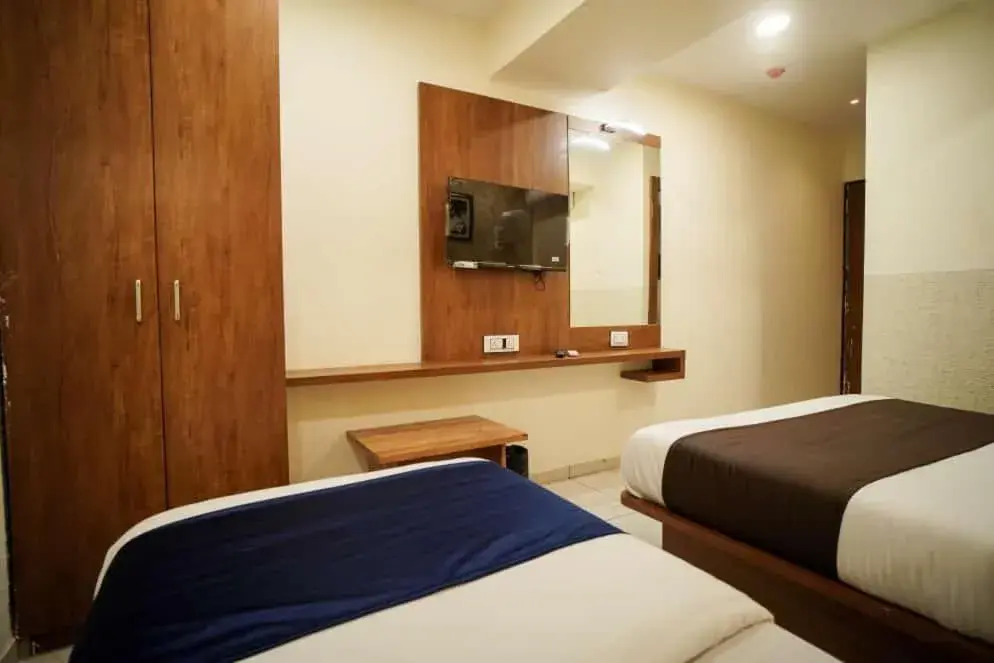 Communal lounge/ TV room, Bed in Hotel Mahaveer Communal lounge/ TV room, Bed in Hotel Mahaveer