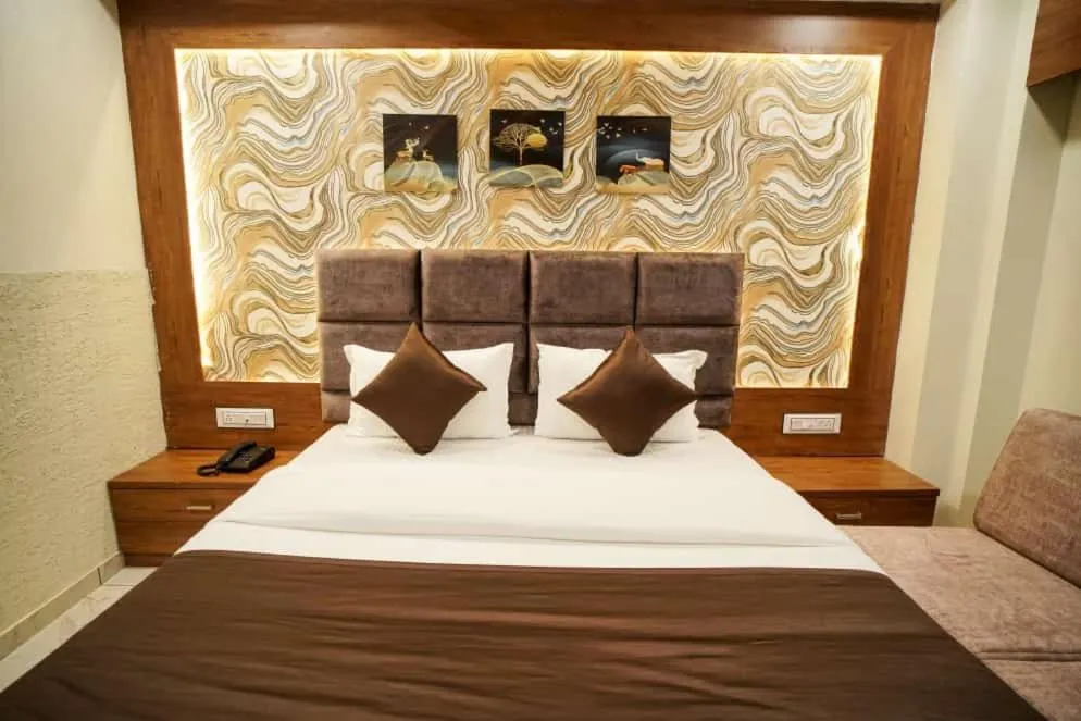 Bed in Hotel Mahaveer