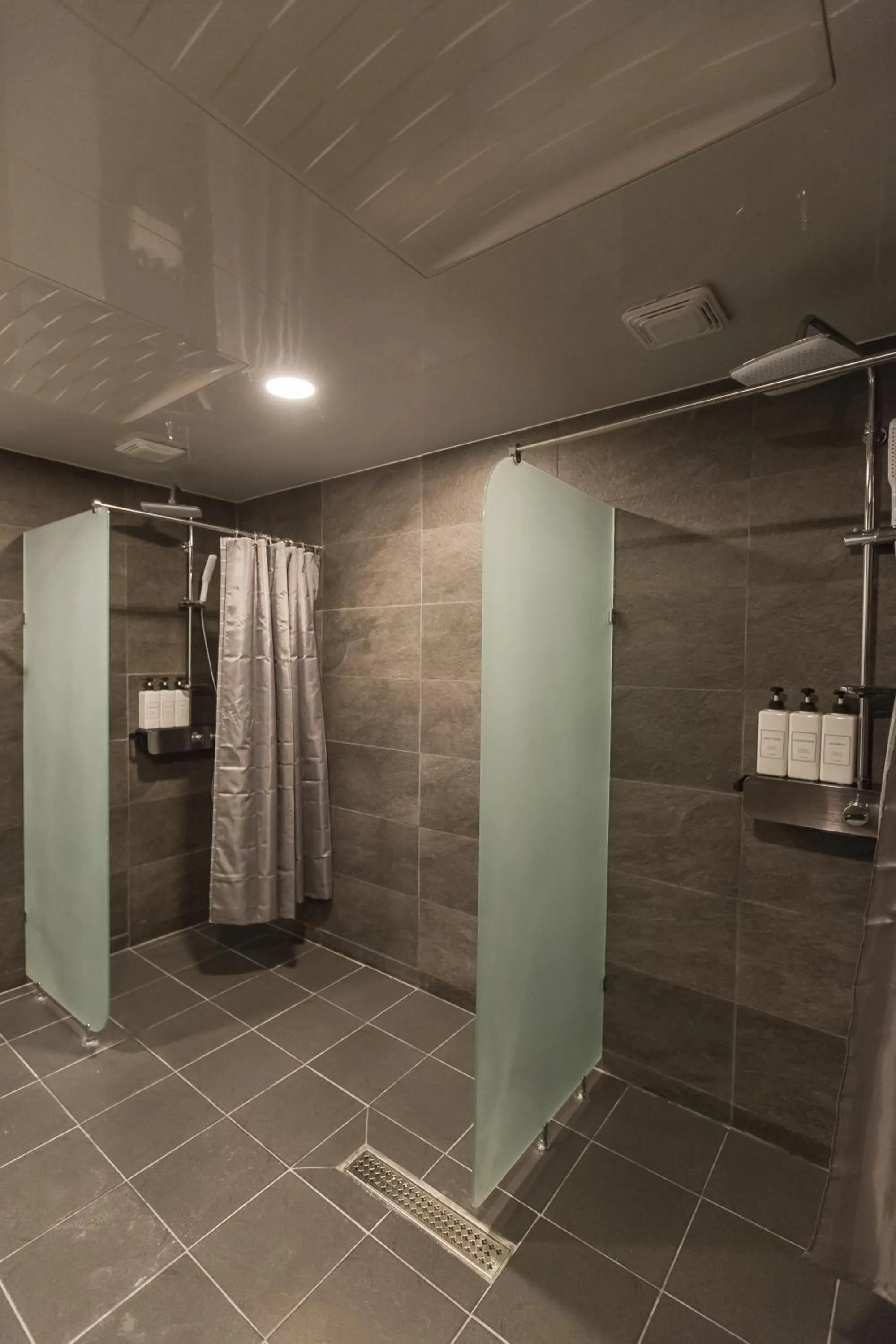 Shower in CANVAS BLACK Guesthouse