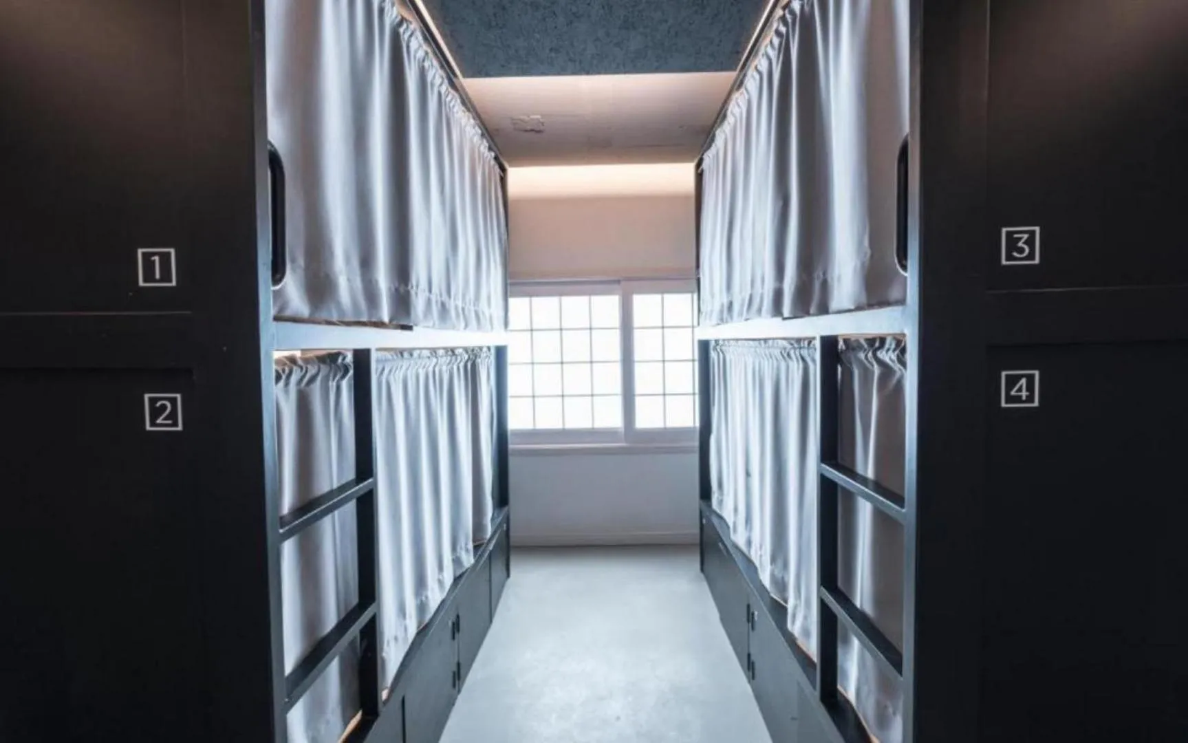 Bed in CANVAS BLACK Guesthouse