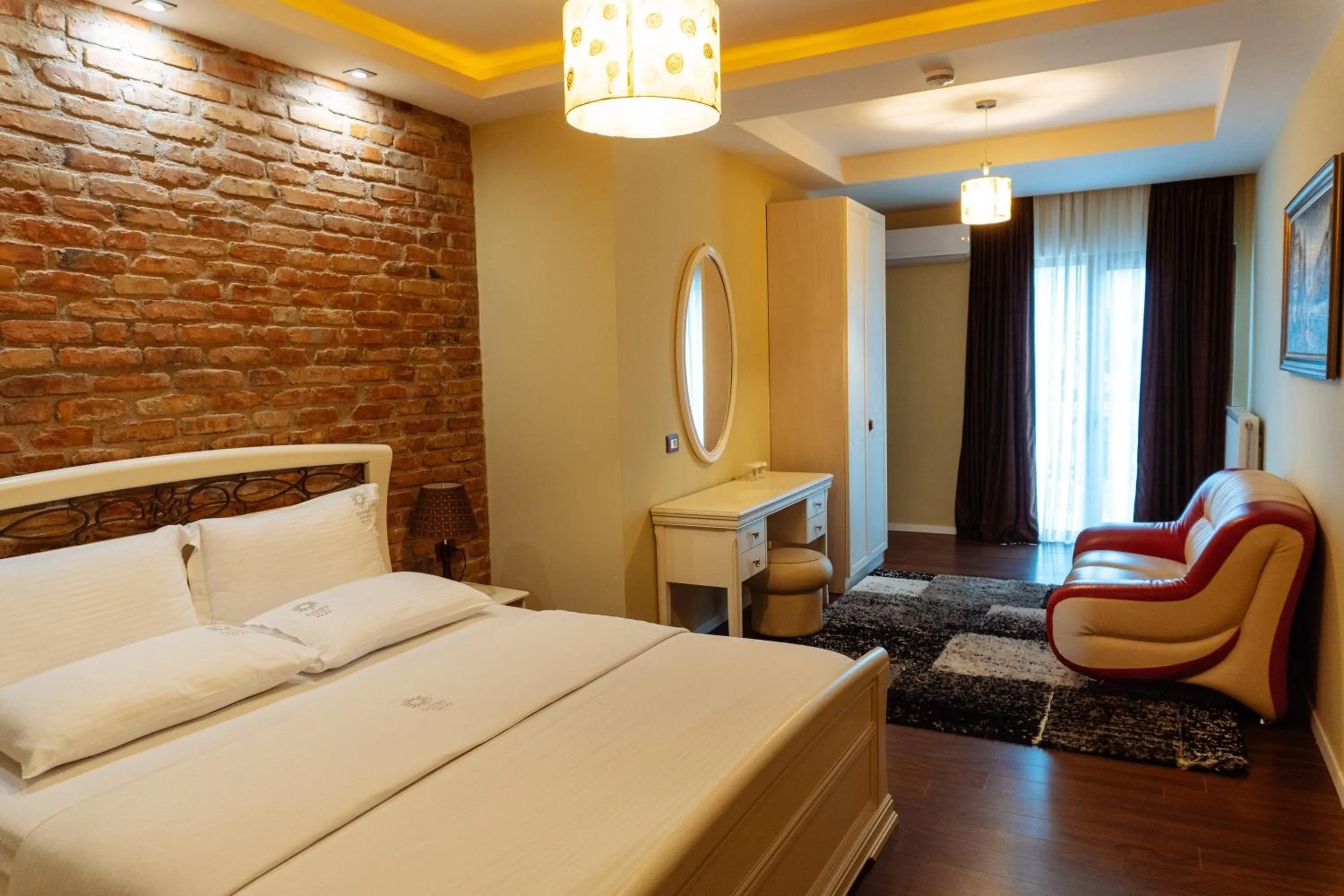 Photo of the whole room, Bed in Casta Diva Boutique Hotel