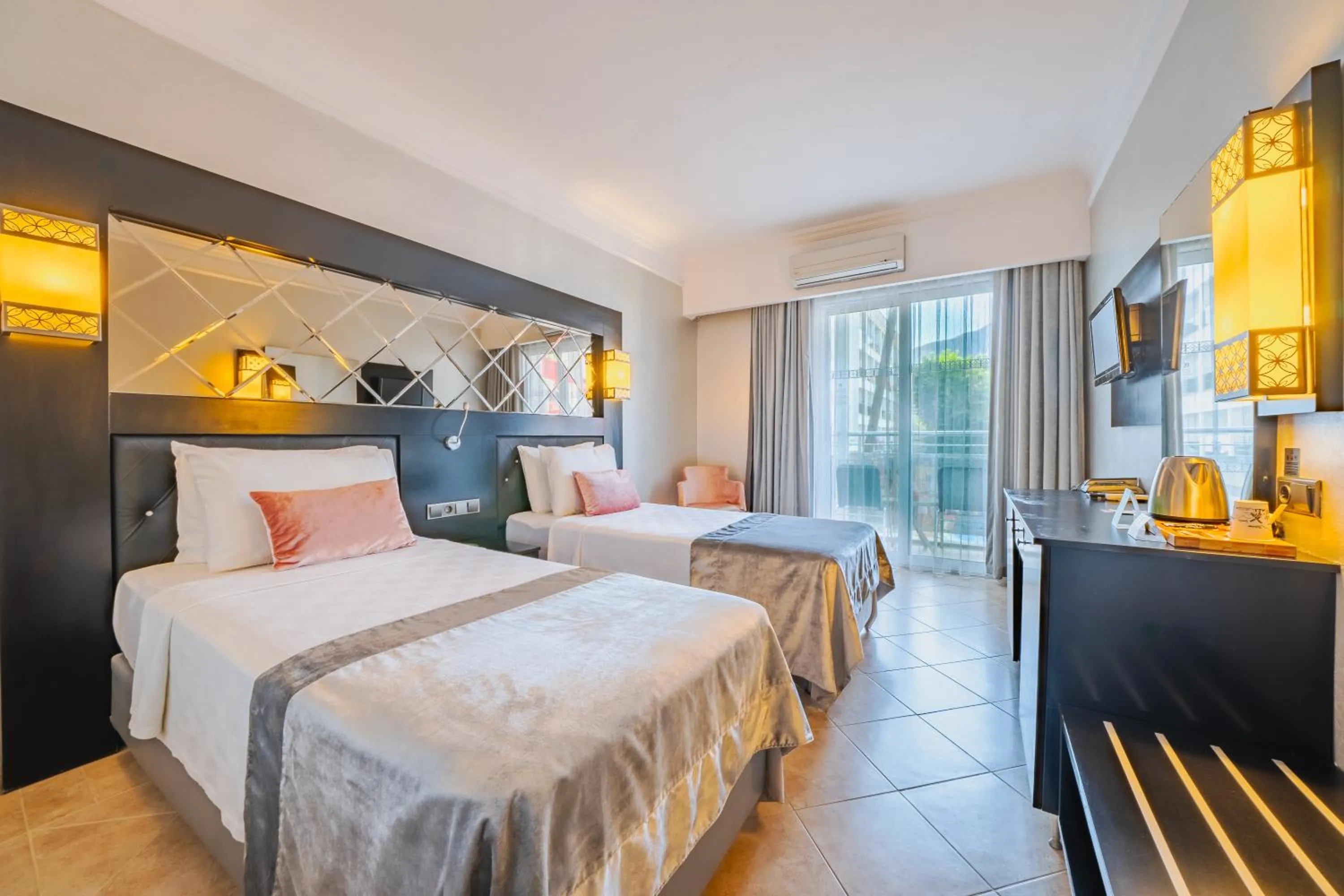 Bed in Prime Beach Hotel