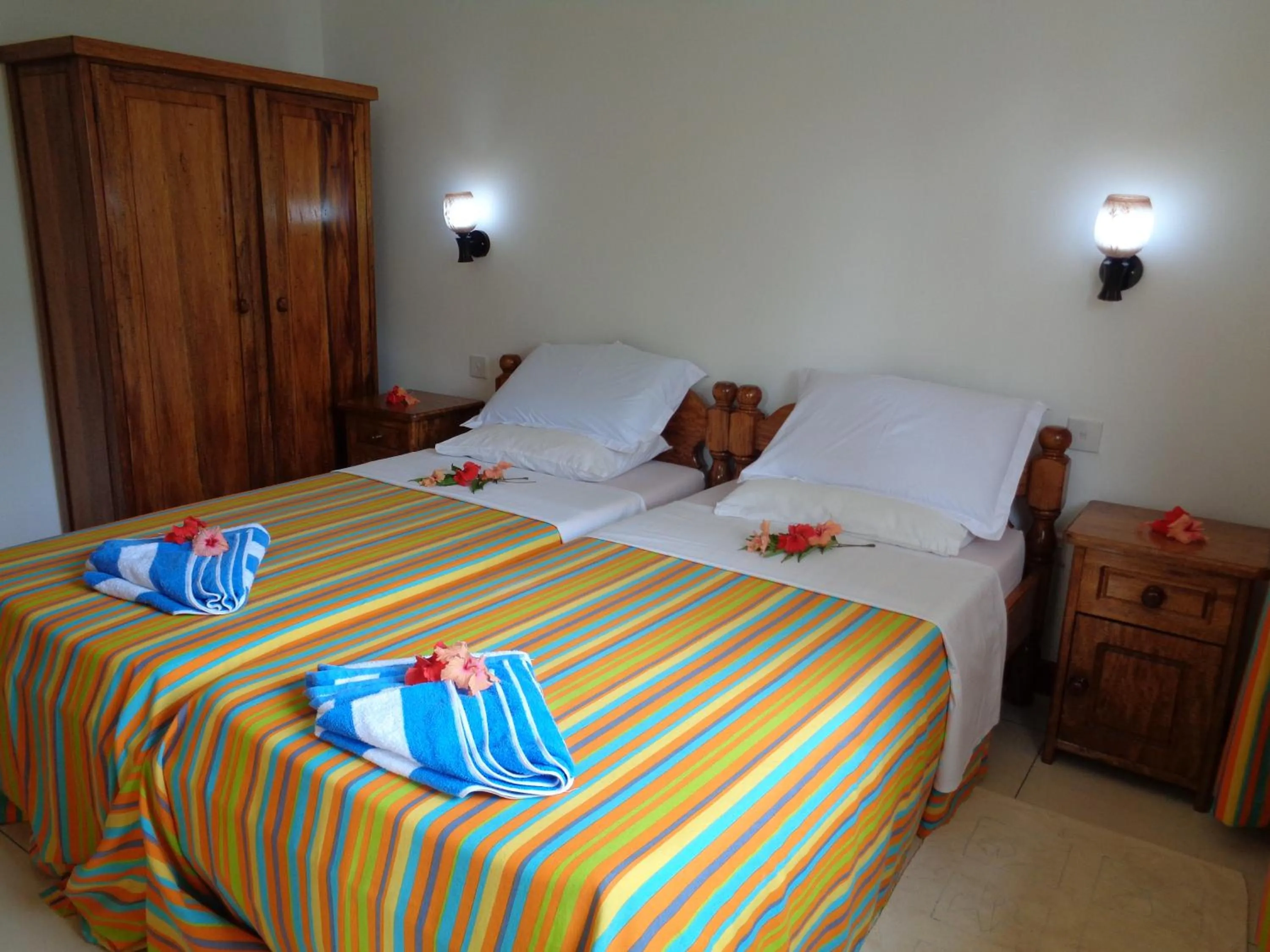 Bed in Chez Michellin Pensions Residence