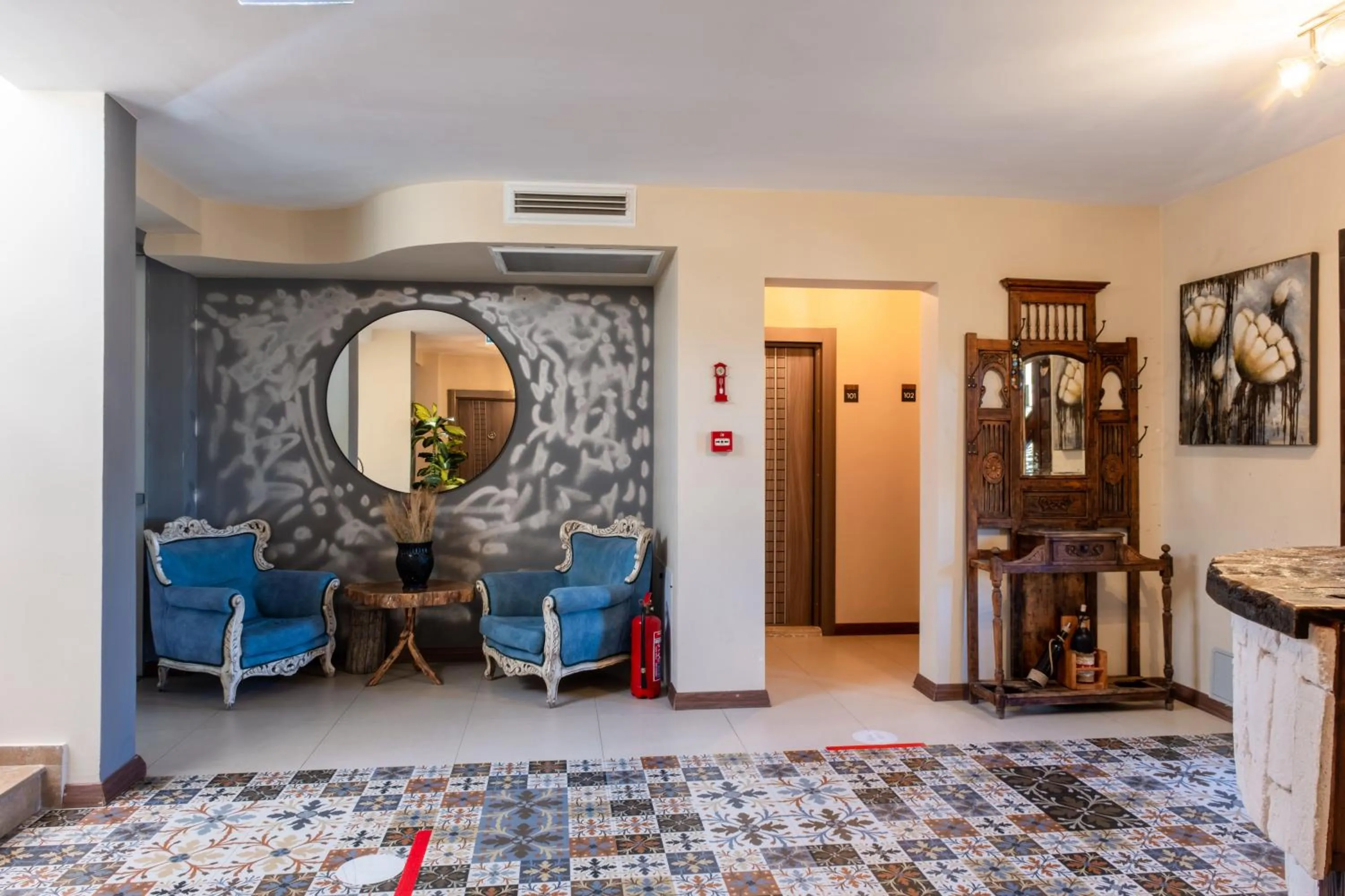 Seating area in Espira by Antioch Hotel