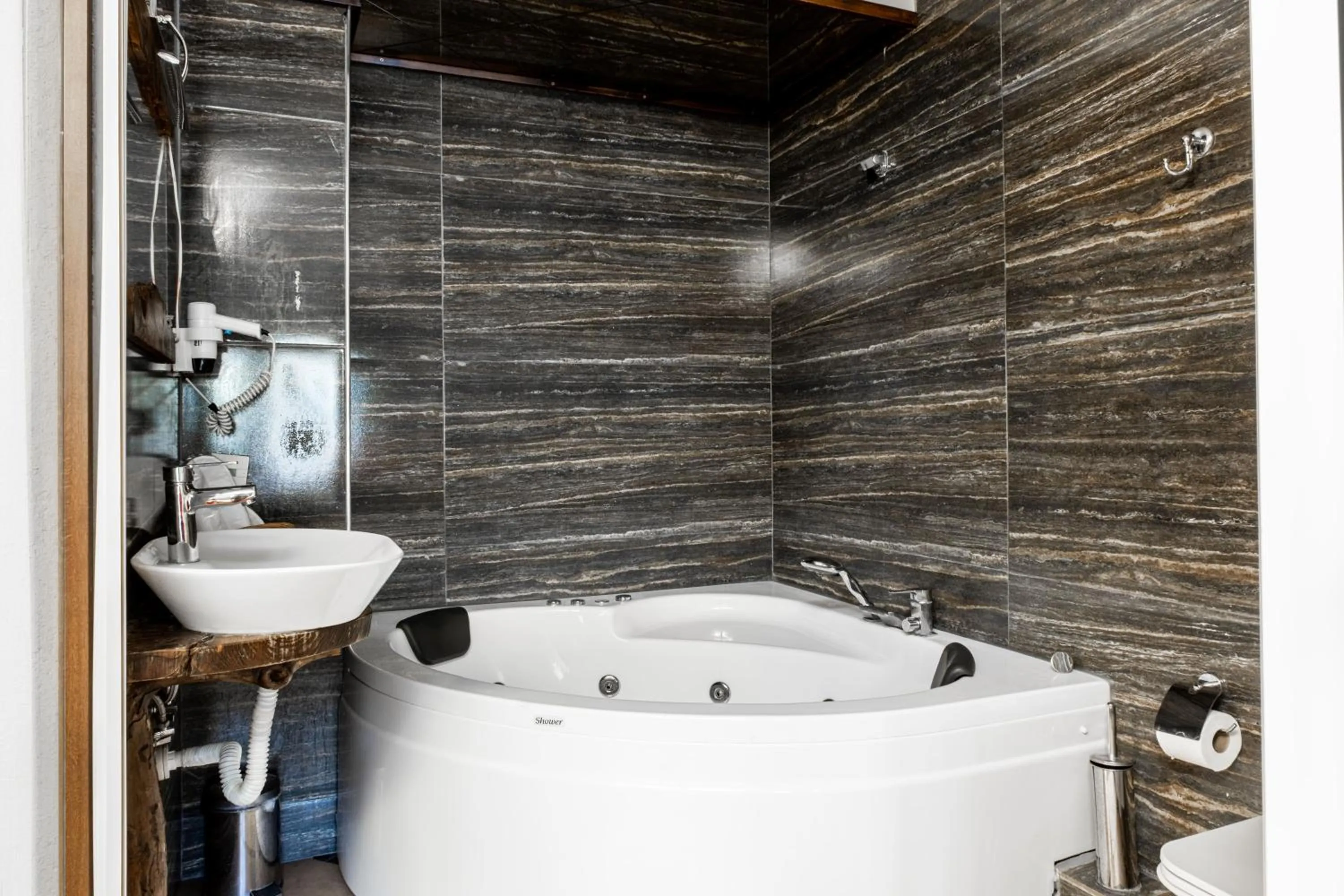 Toilet in Espira by Antioch Hotel