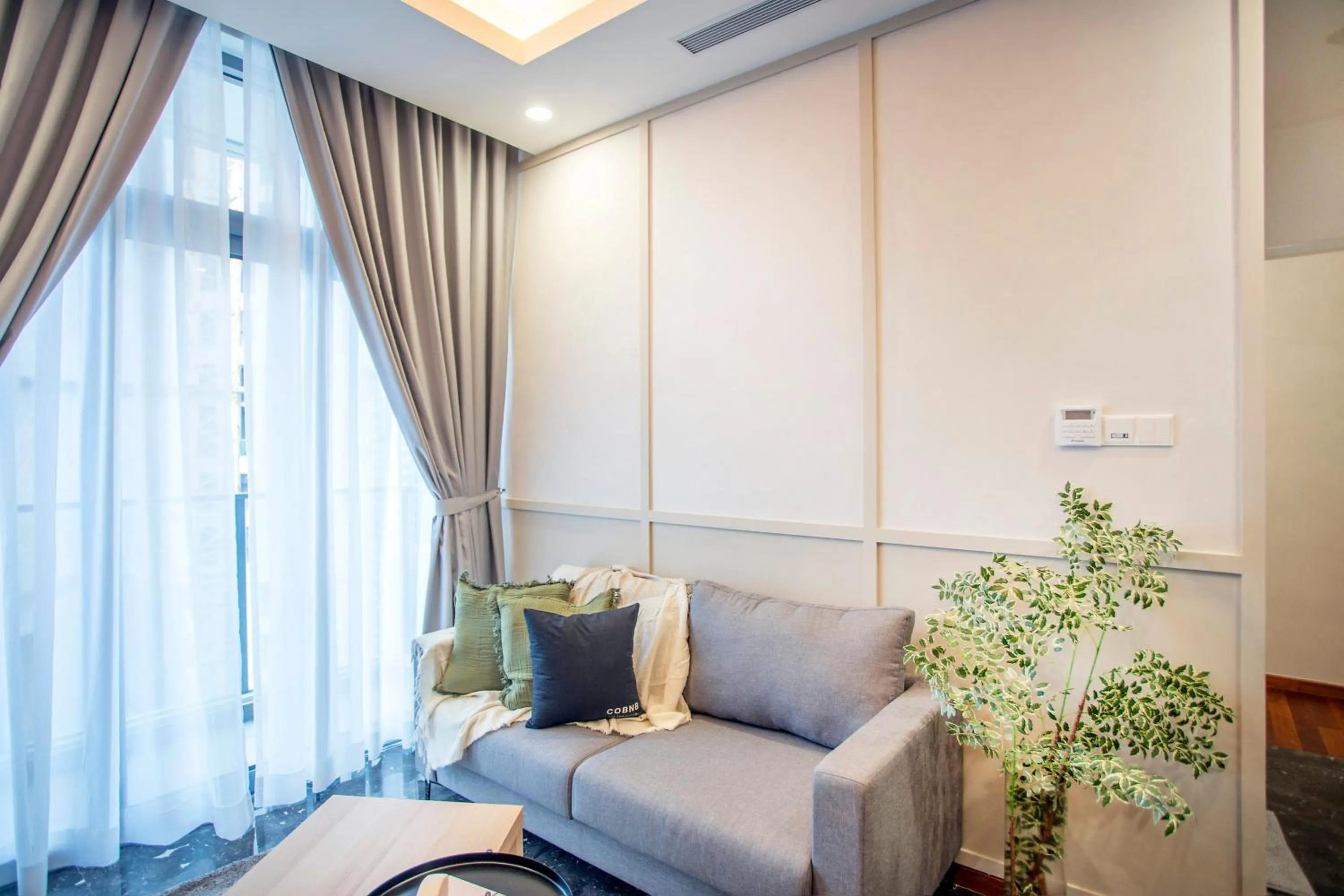 Living room in Royce Residence KLCC by Cobnb