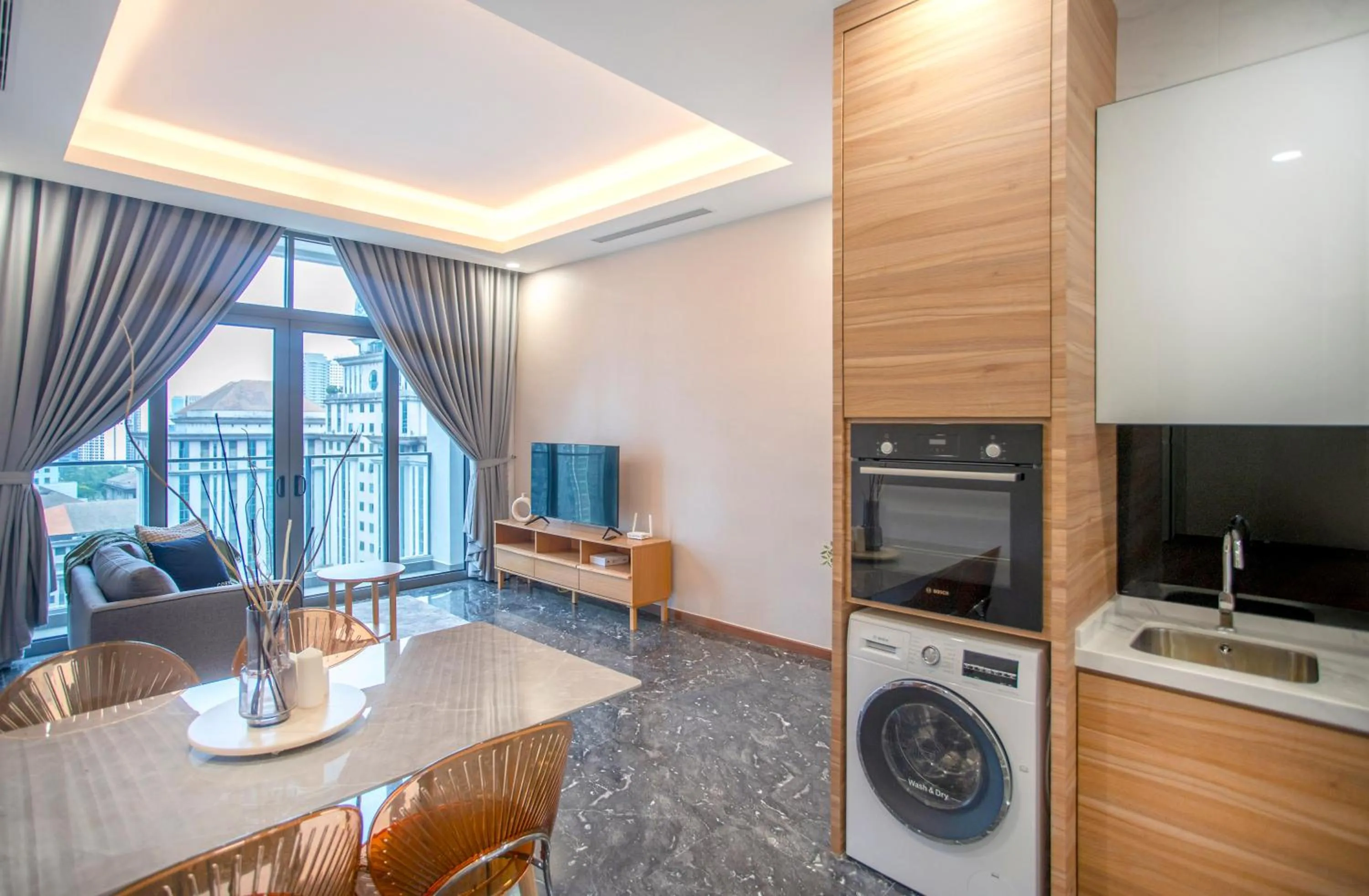 Communal lounge/ TV room in Royce Residence KLCC by Cobnb