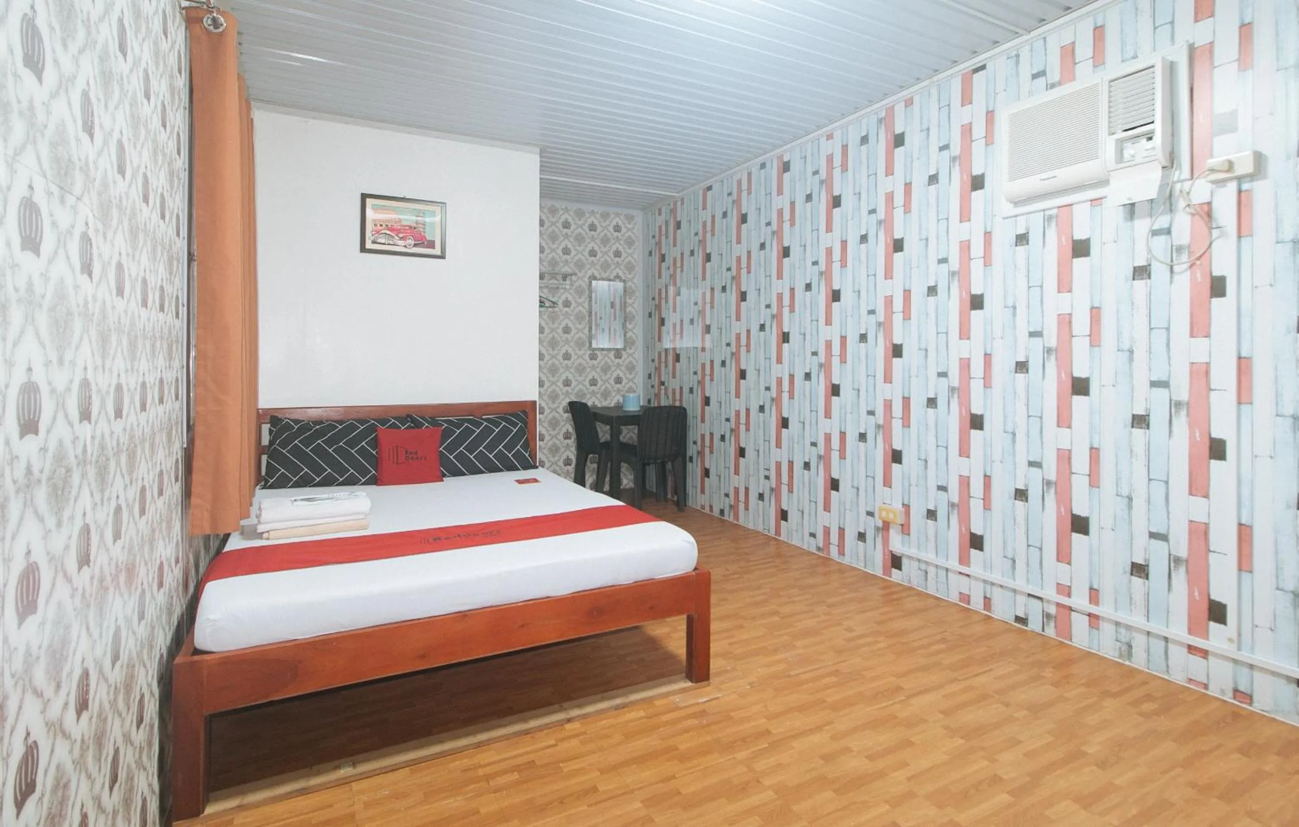 Photo of the whole room, Bed in RedDoorz @ Boondocks Cabins Resort