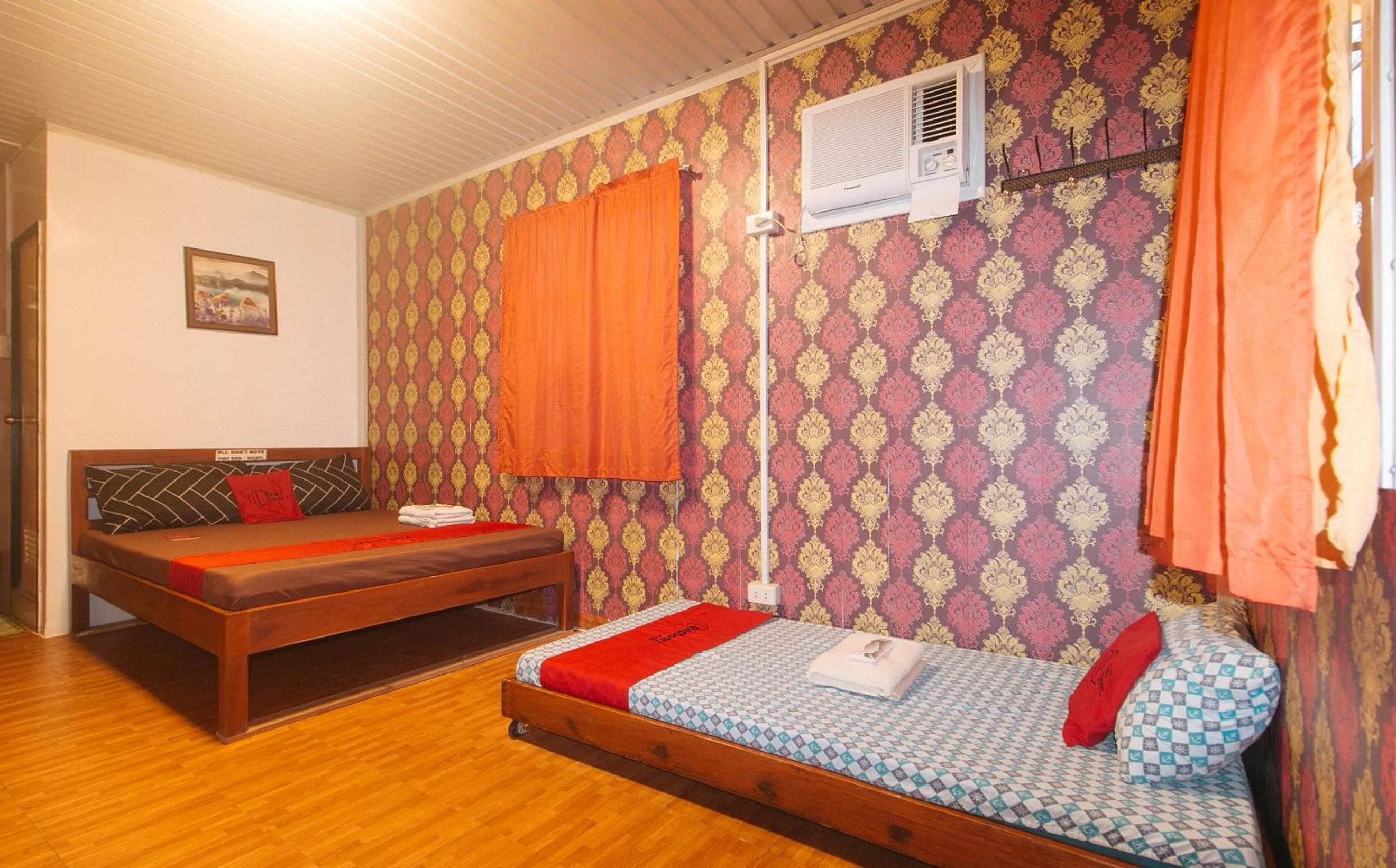 Photo of the whole room, Bed in RedDoorz @ Boondocks Cabins Resort