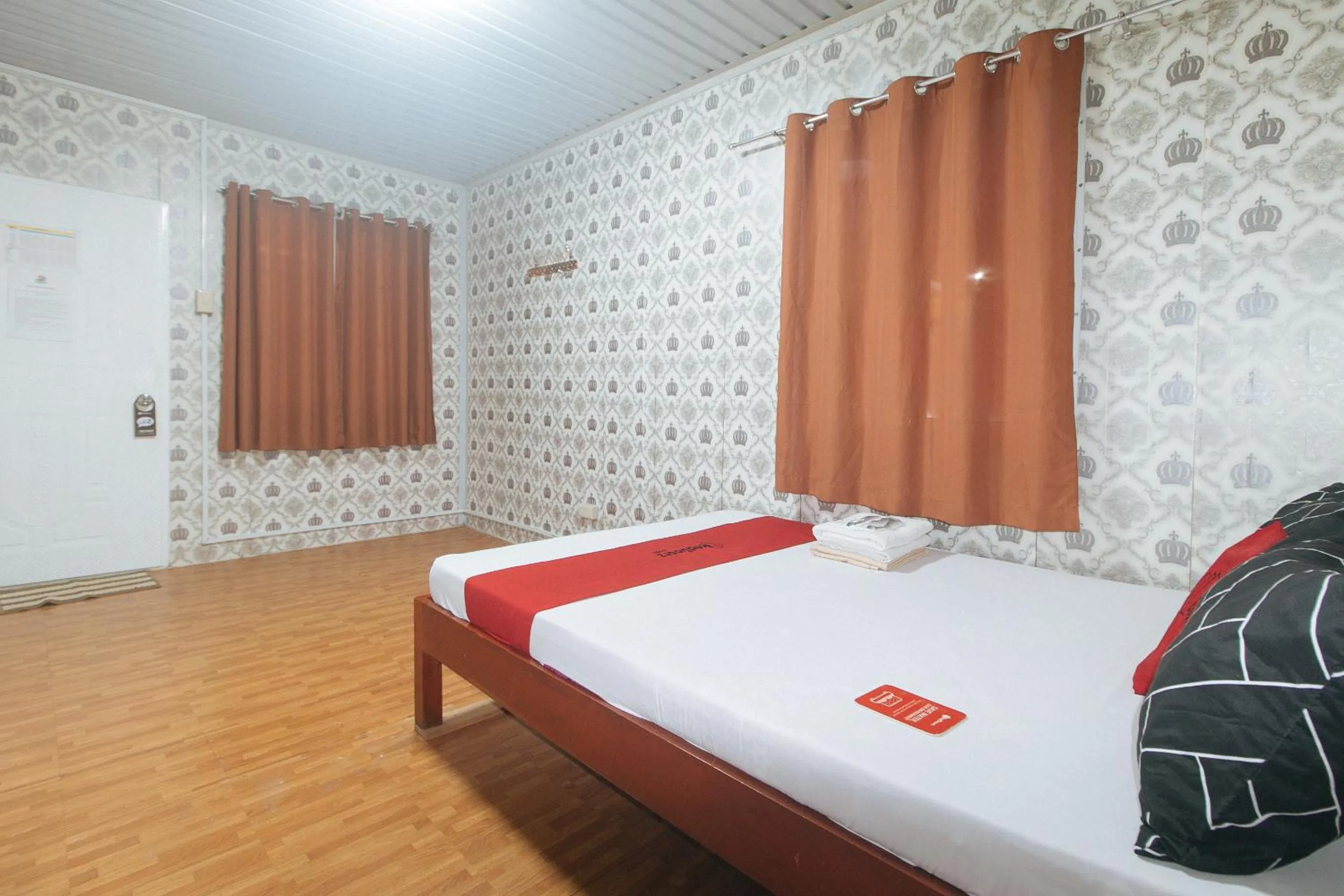 Bedroom, Bed in RedDoorz @ Boondocks Cabins Resort