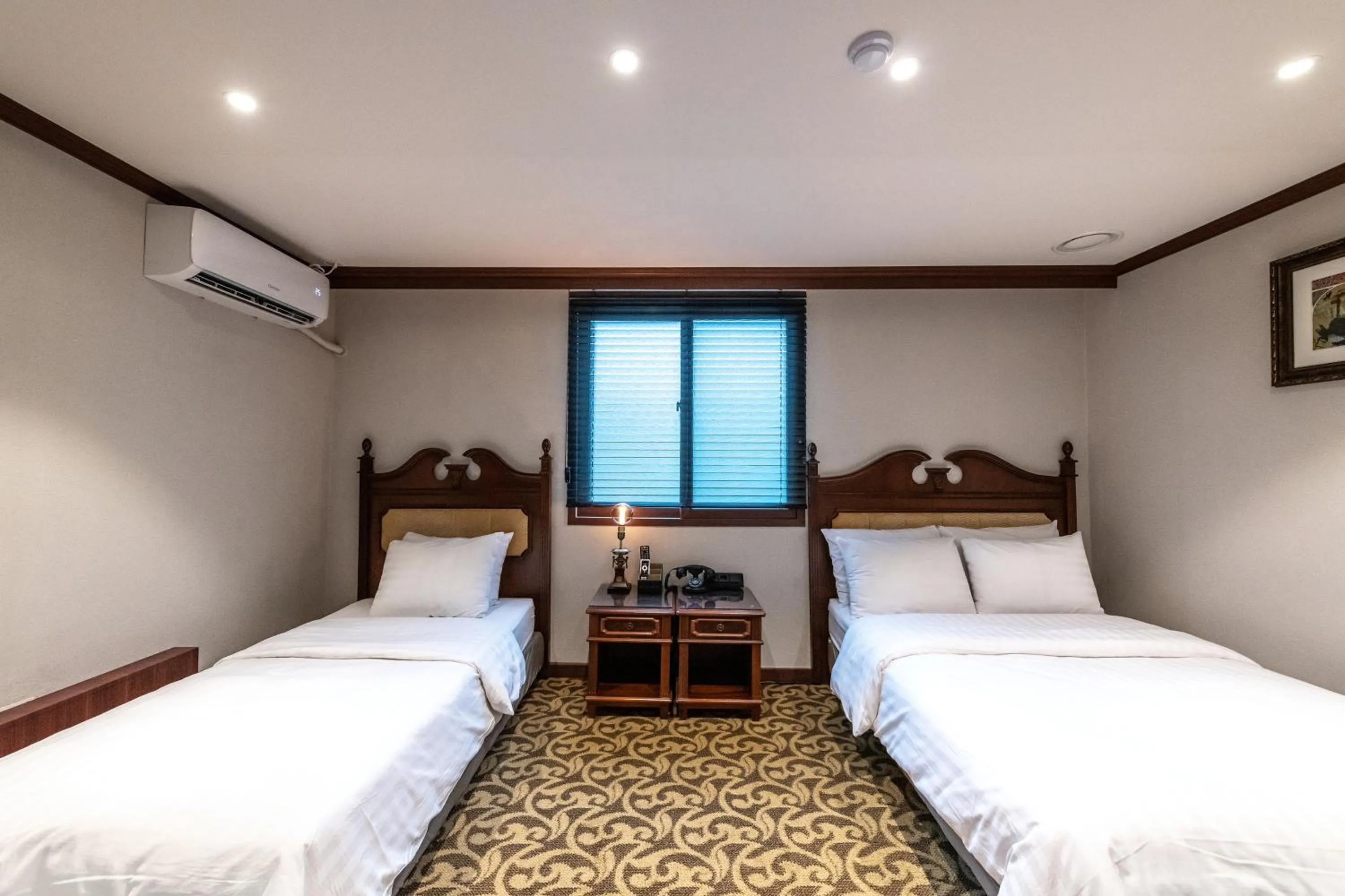 Bed in New Cheonji Hotel