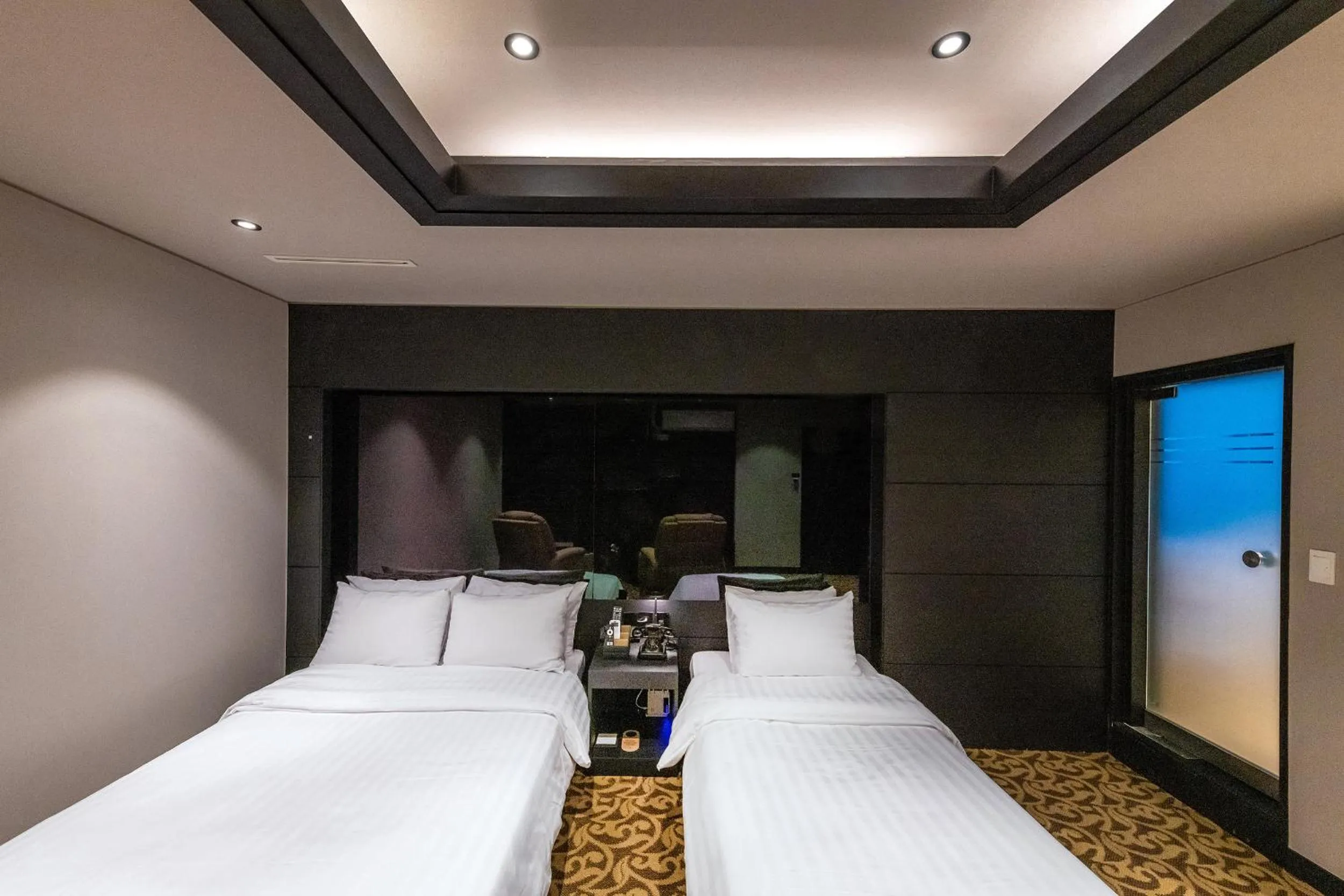 Bed in New Cheonji Hotel