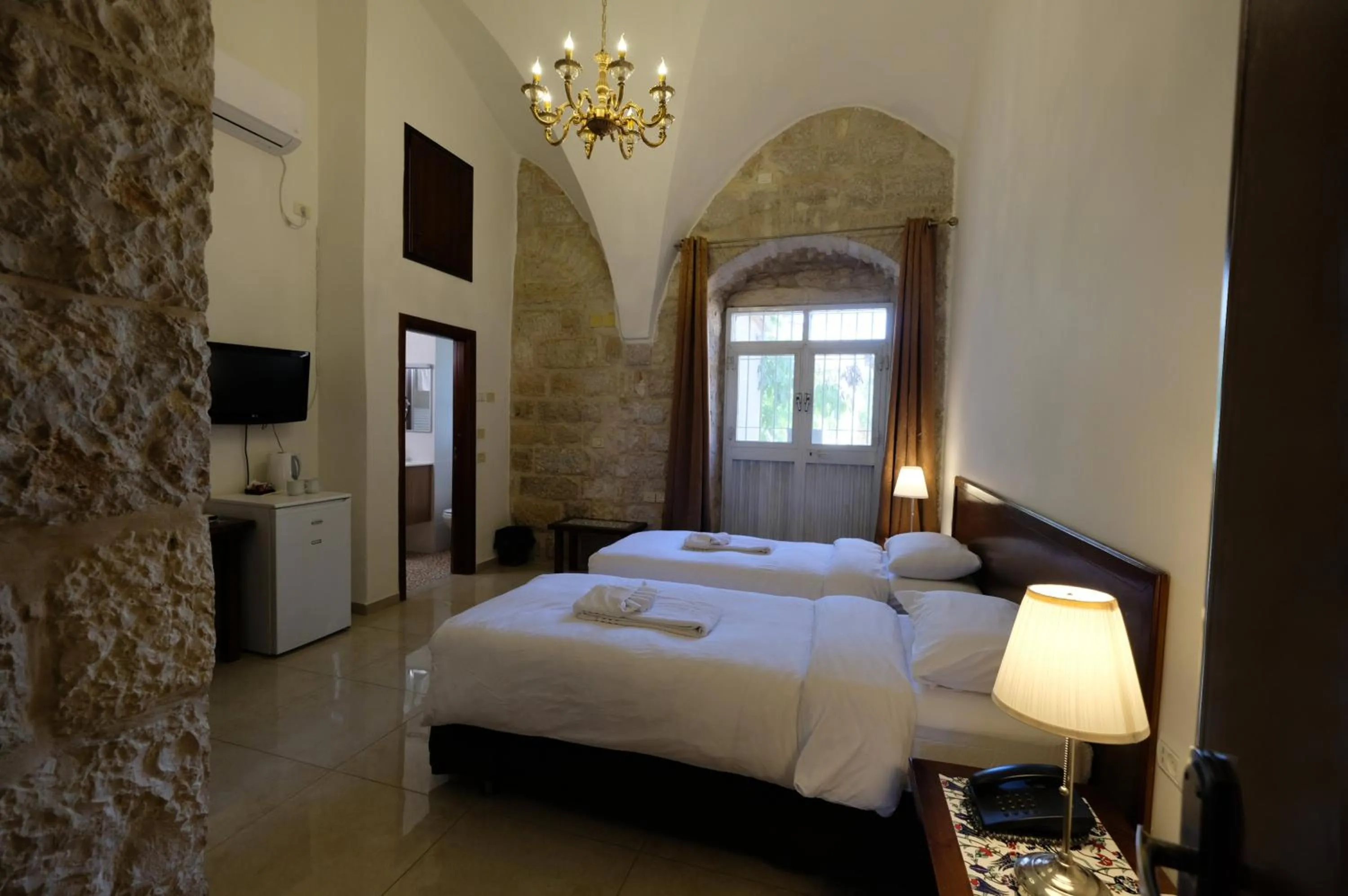 Photo of the whole room, Bed in St. George’s Cathedral Pilgrim Guesthouse – Jerusalem