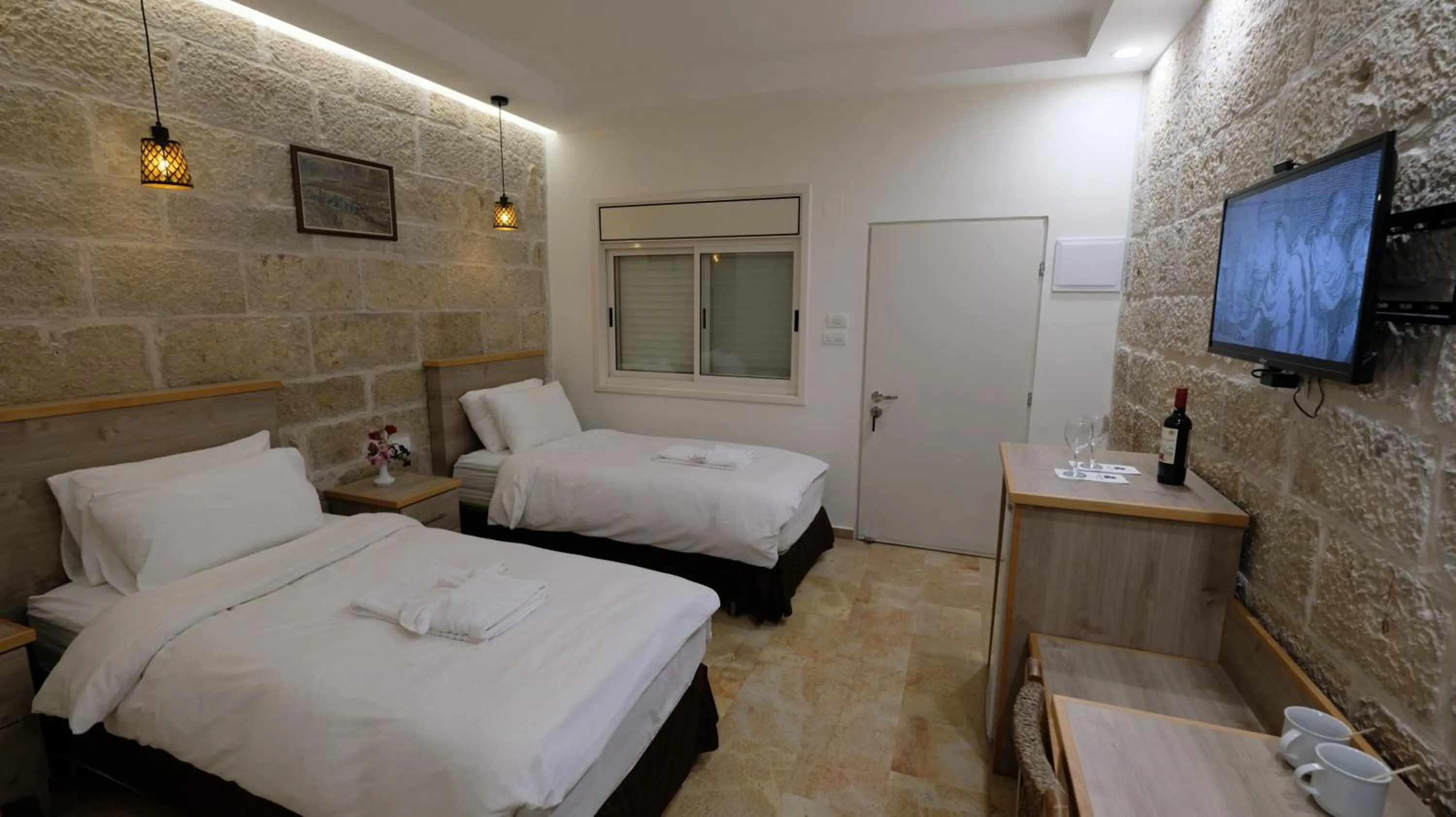 Photo of the whole room, Bed in St. George’s Cathedral Pilgrim Guesthouse – Jerusalem