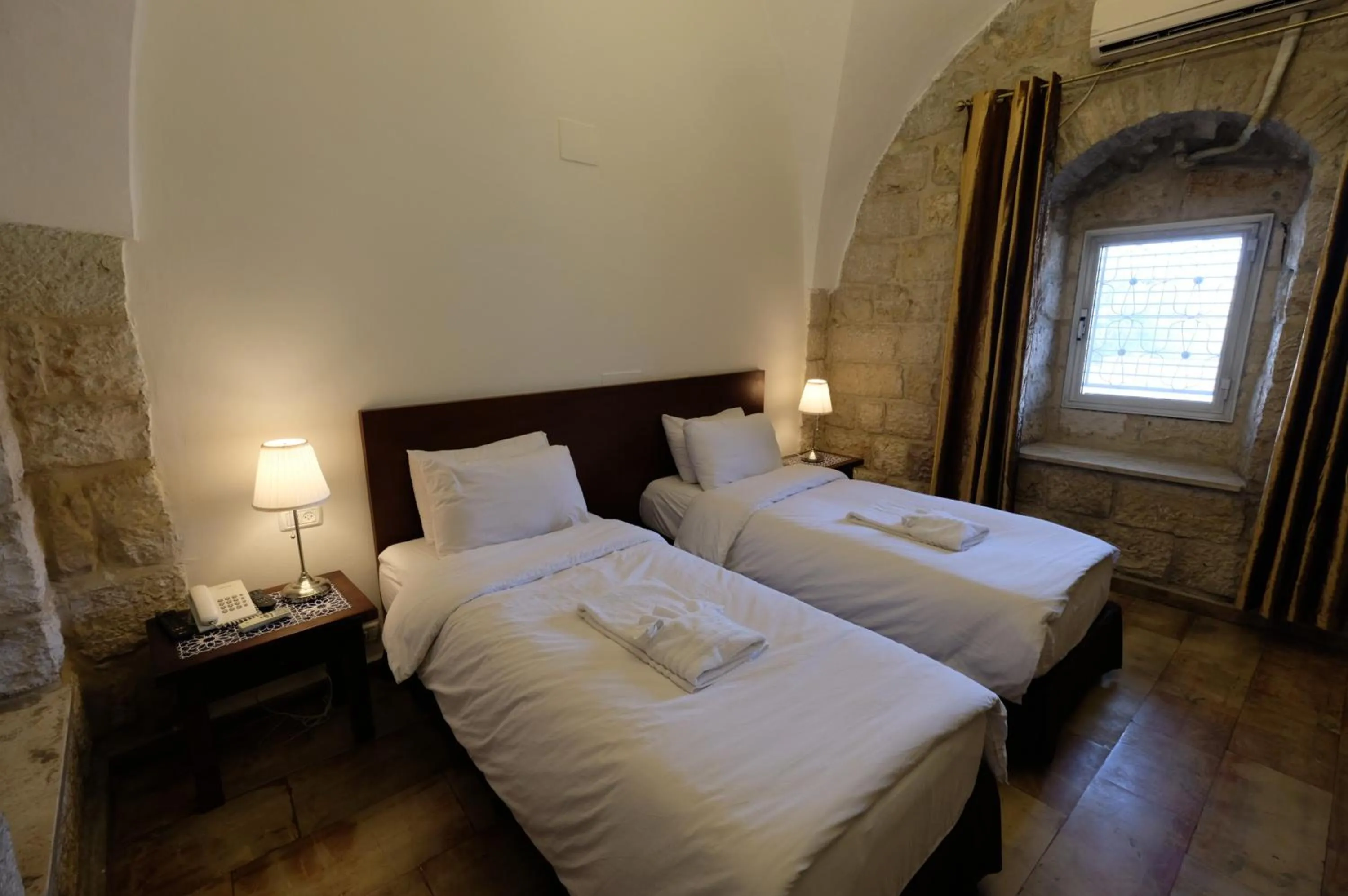 Photo of the whole room, Bed in St. George’s Cathedral Pilgrim Guesthouse – Jerusalem