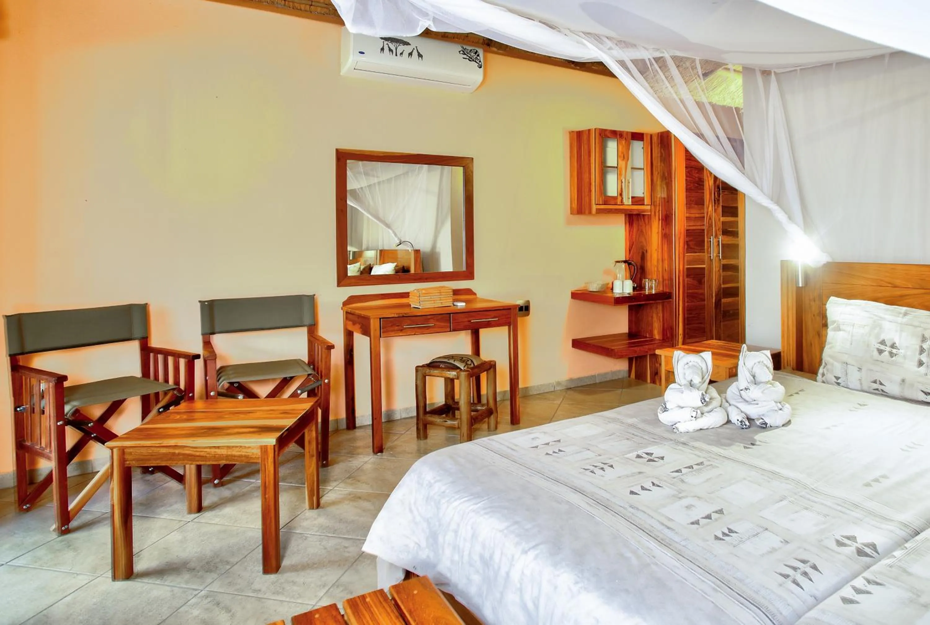 Bed in Kubu Safari Lodge