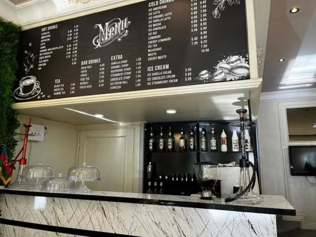 Lounge or bar in Karat Inn Boutique Hotel