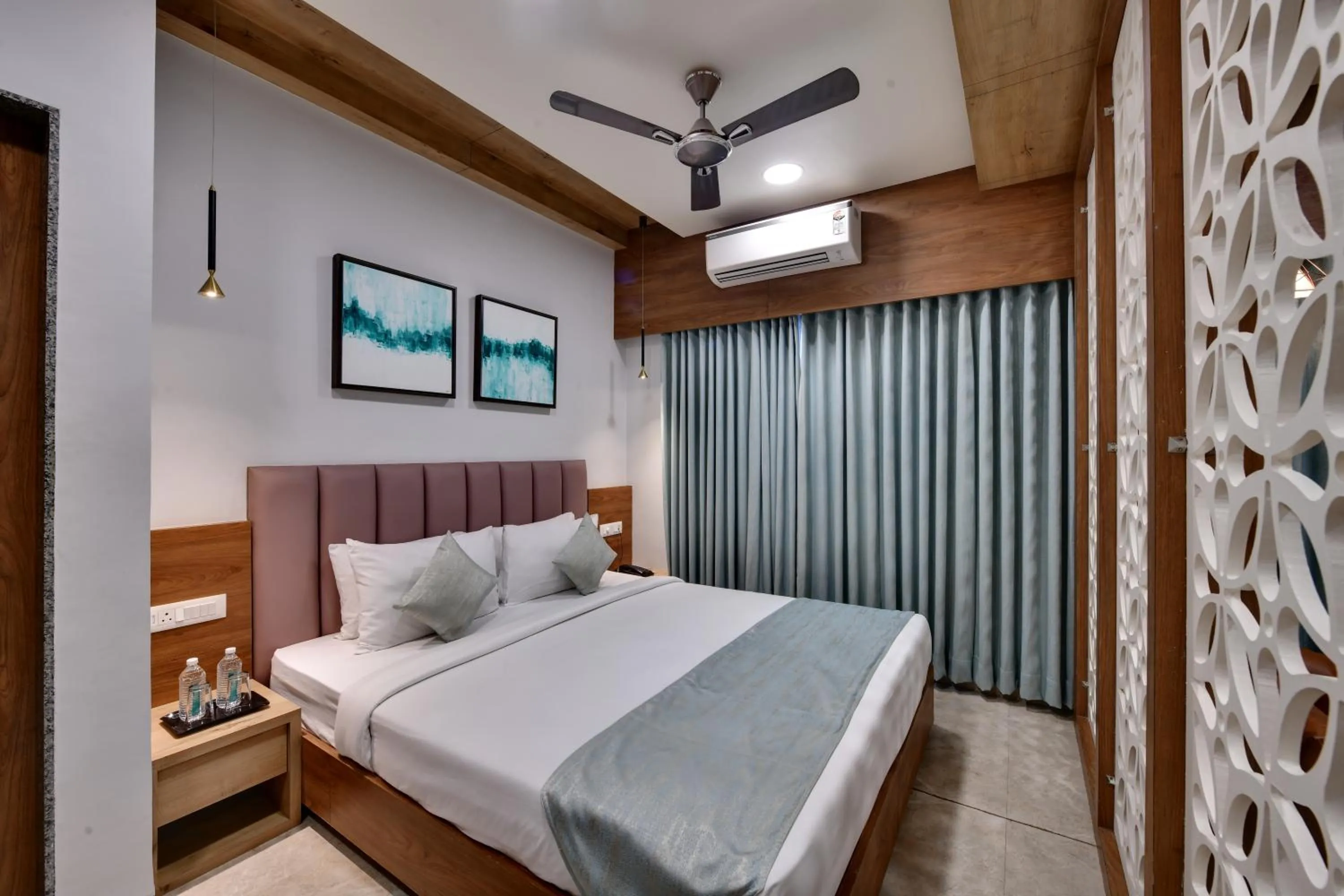 Bedroom in HOTEL RADHIKA