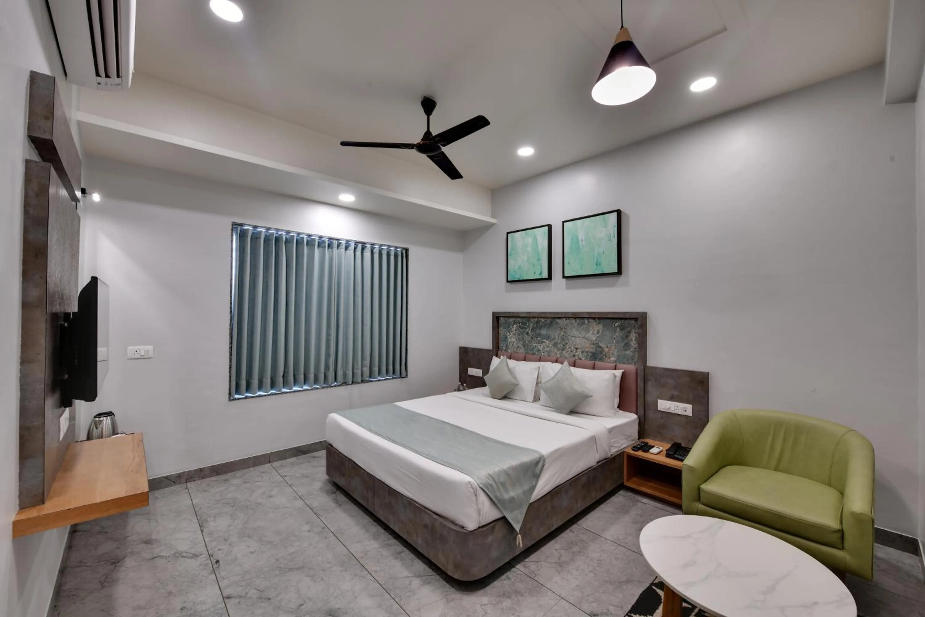 Bedroom in HOTEL RADHIKA