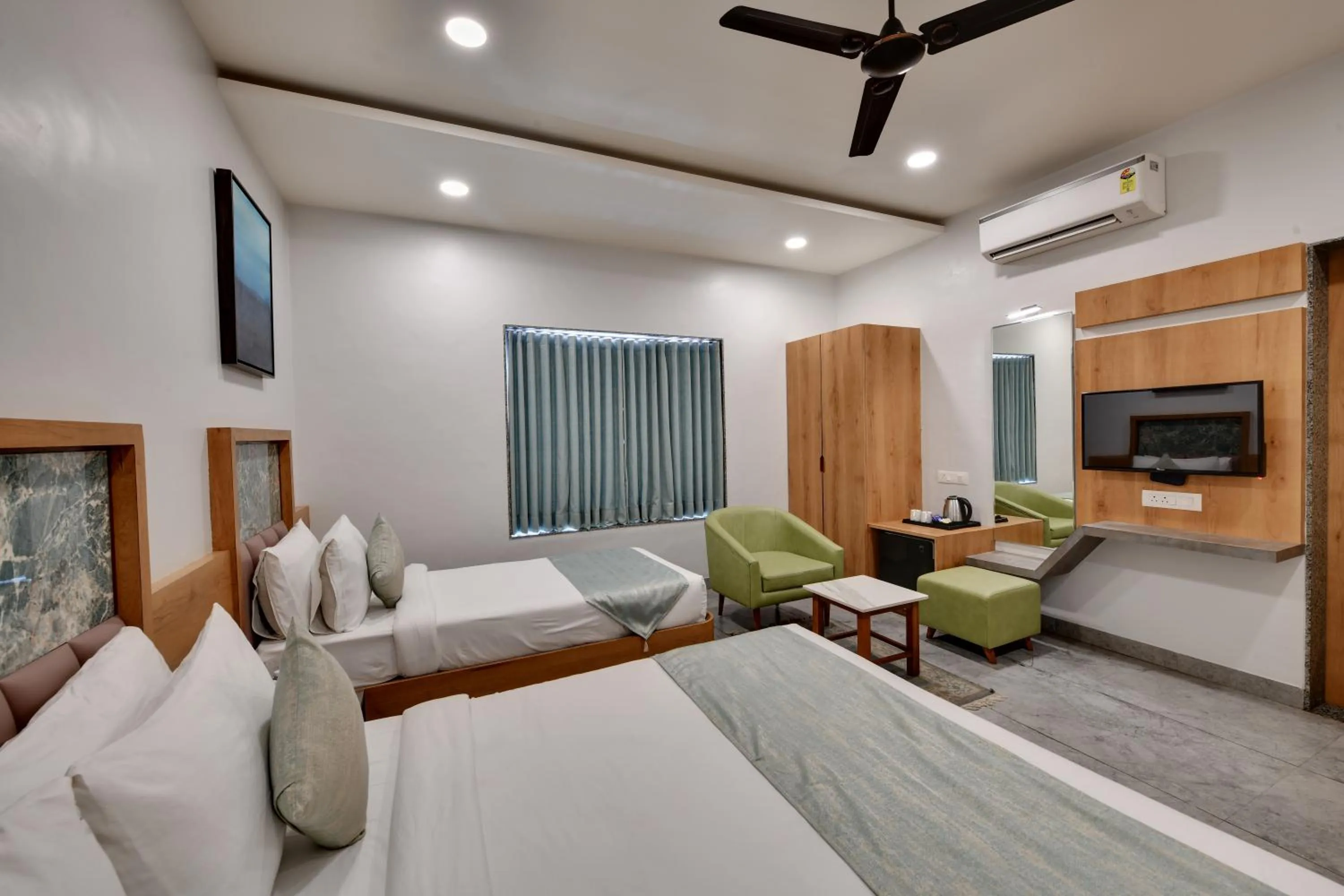 Bedroom in HOTEL RADHIKA