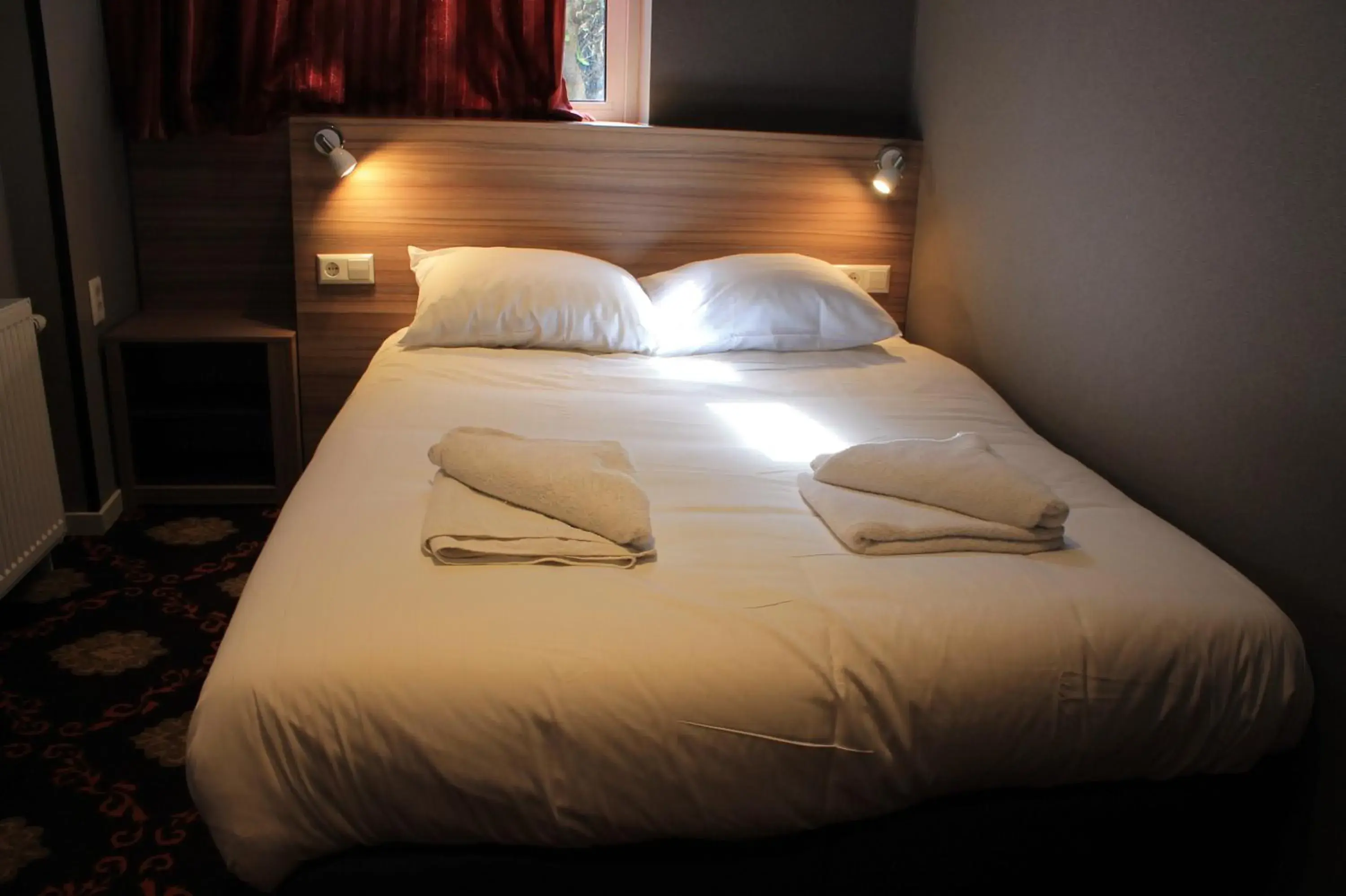 Photo of the whole room, Bed in Aston City Hotel Photo of the whole room, Bed in Aston City Hotel