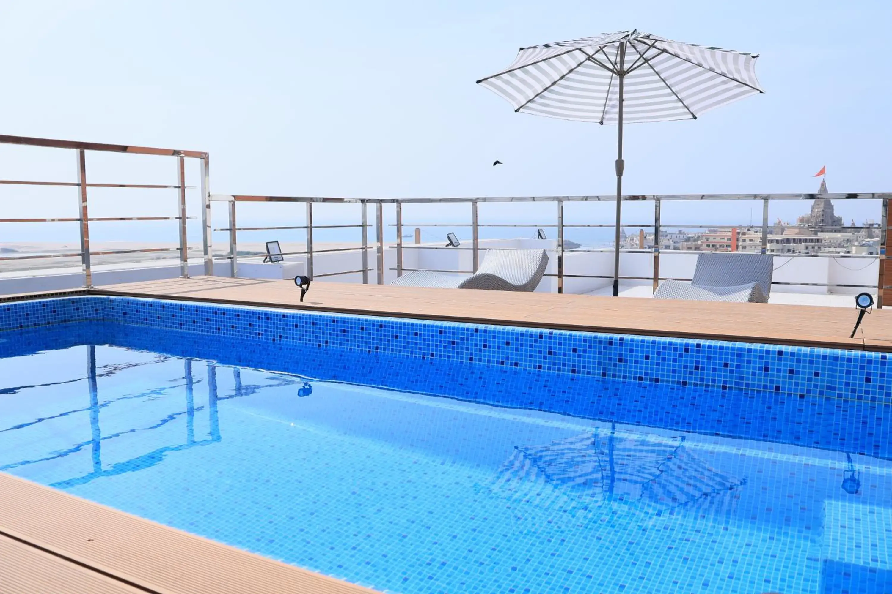 Swimming pool in Pride Elite Dwarka Near Dwarkadhish Temple Swimming pool in Pride Elite Dwarka Near Dwarkadhish Temple