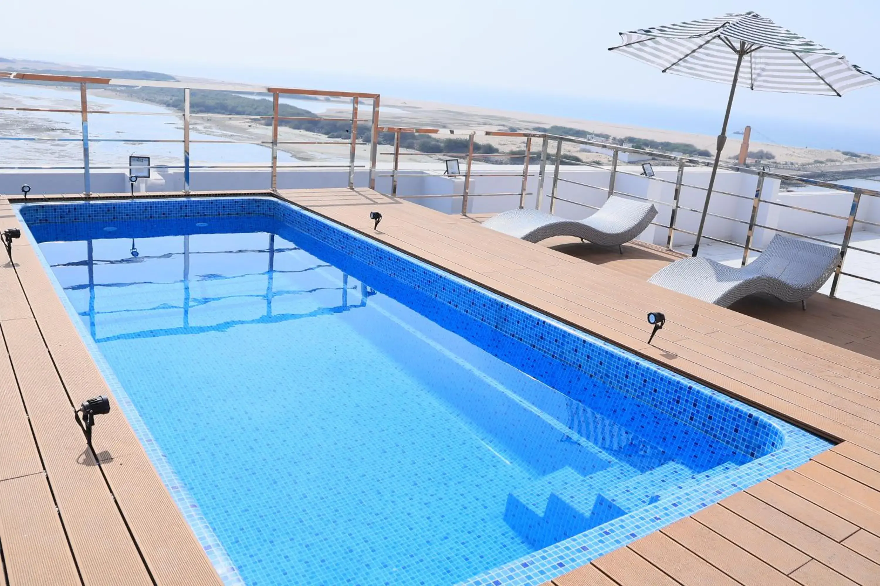 Swimming pool in Pride Elite Dwarka Near Dwarkadhish Temple Swimming pool in Pride Elite Dwarka Near Dwarkadhish Temple