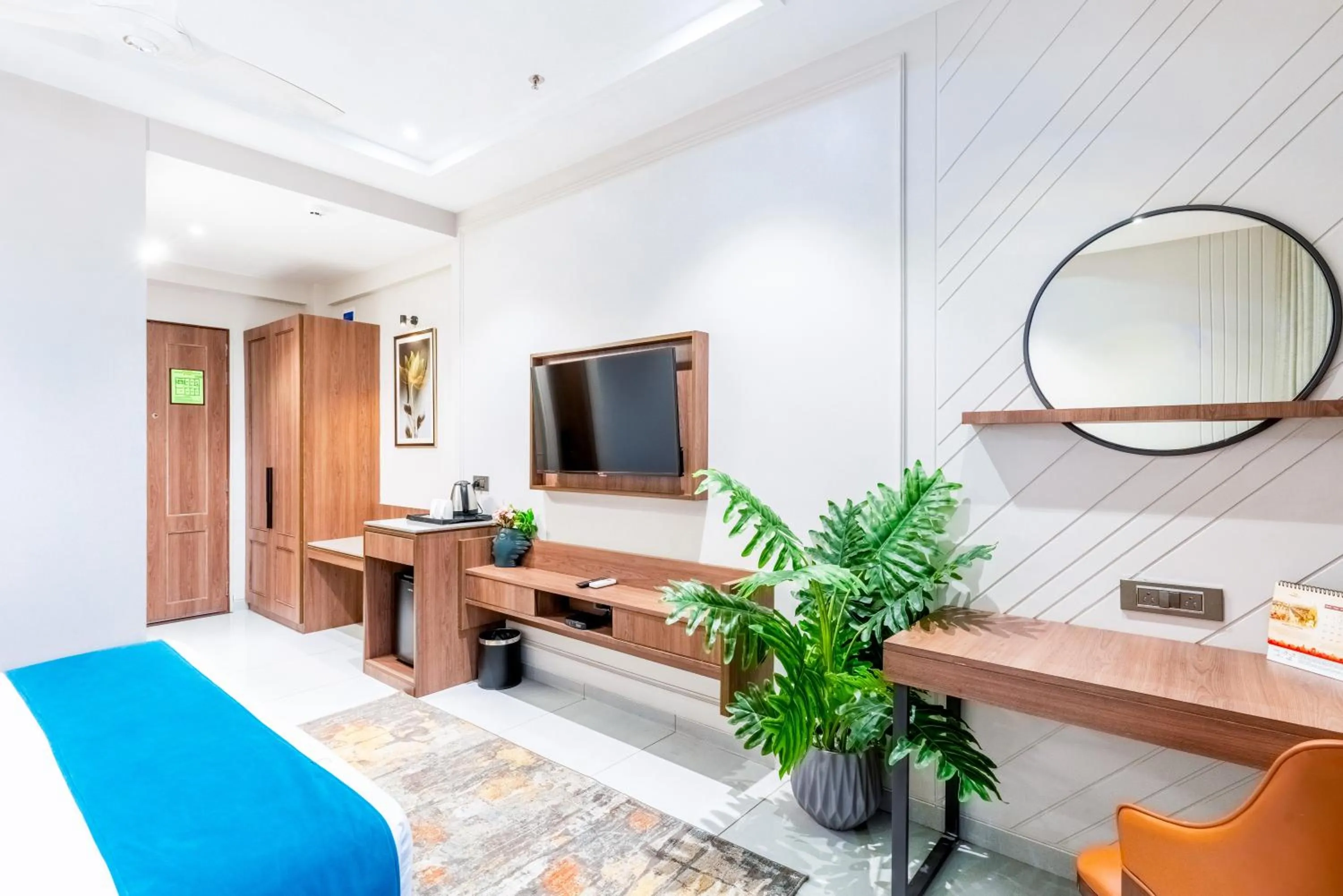 Bedroom in Pride Elite Dwarka Near Dwarkadhish Temple