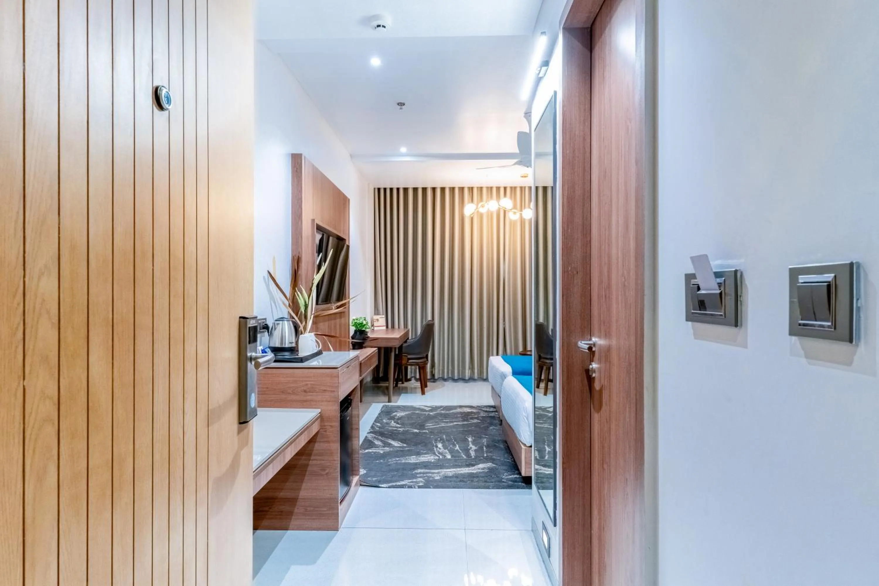 Bedroom in Pride Elite Dwarka Near Dwarkadhish Temple