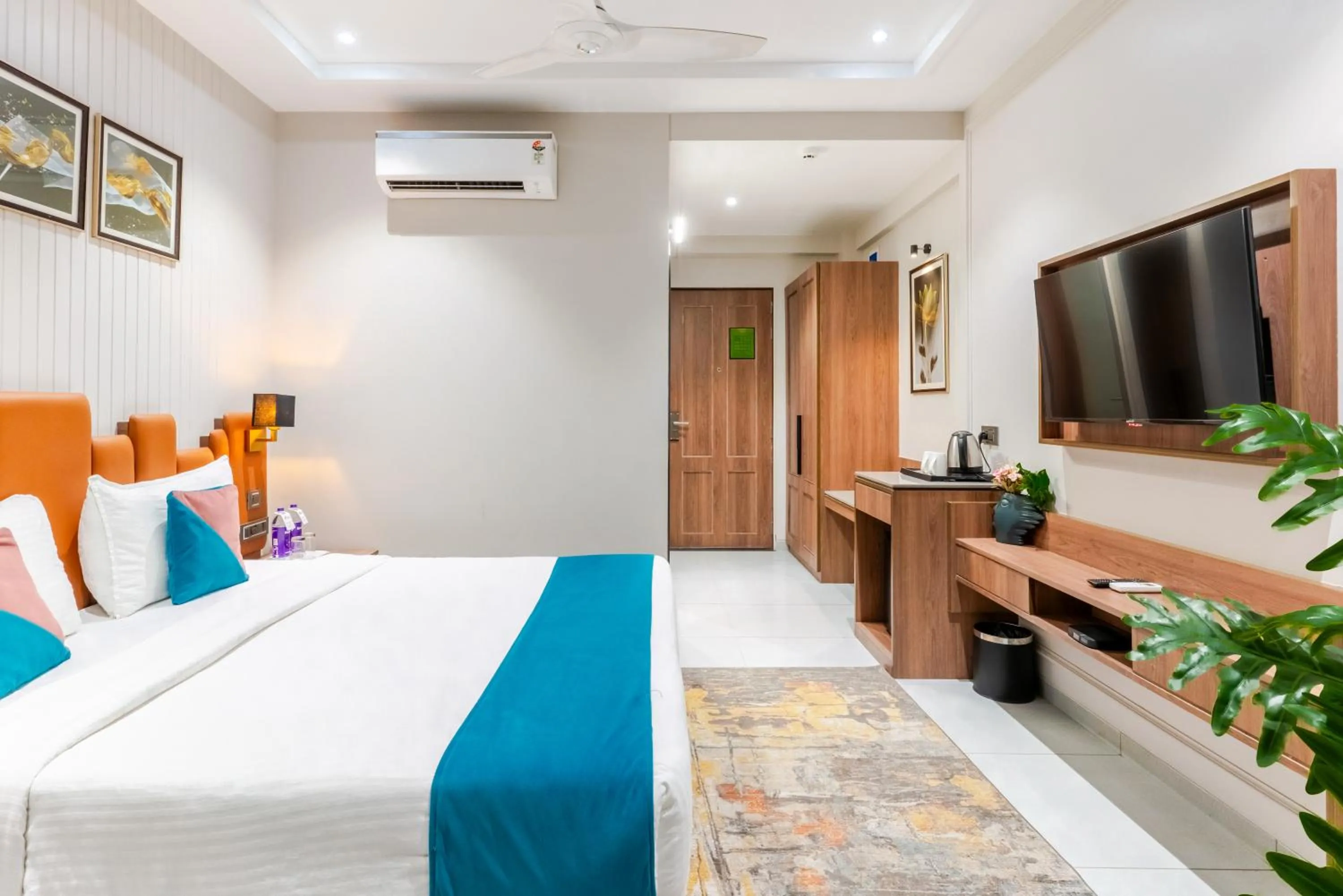 Photo of the whole room, Bed in Pride Elite Dwarka Near Dwarkadhish Temple