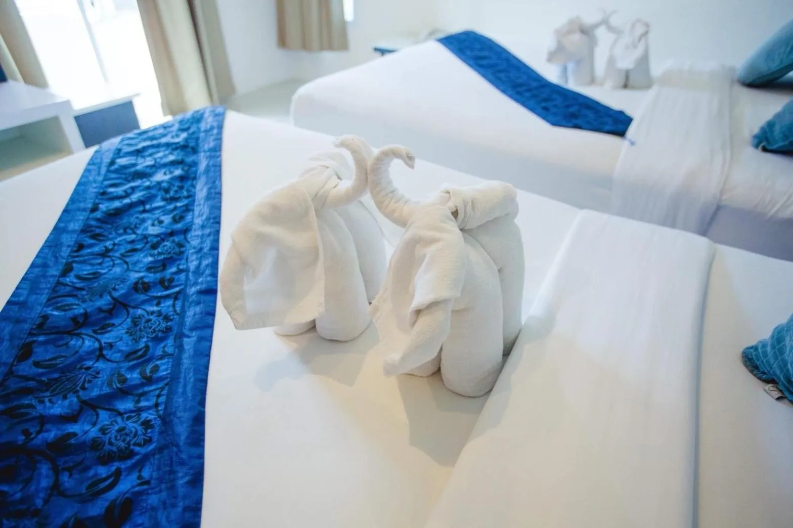 Bed in Excella Hotel