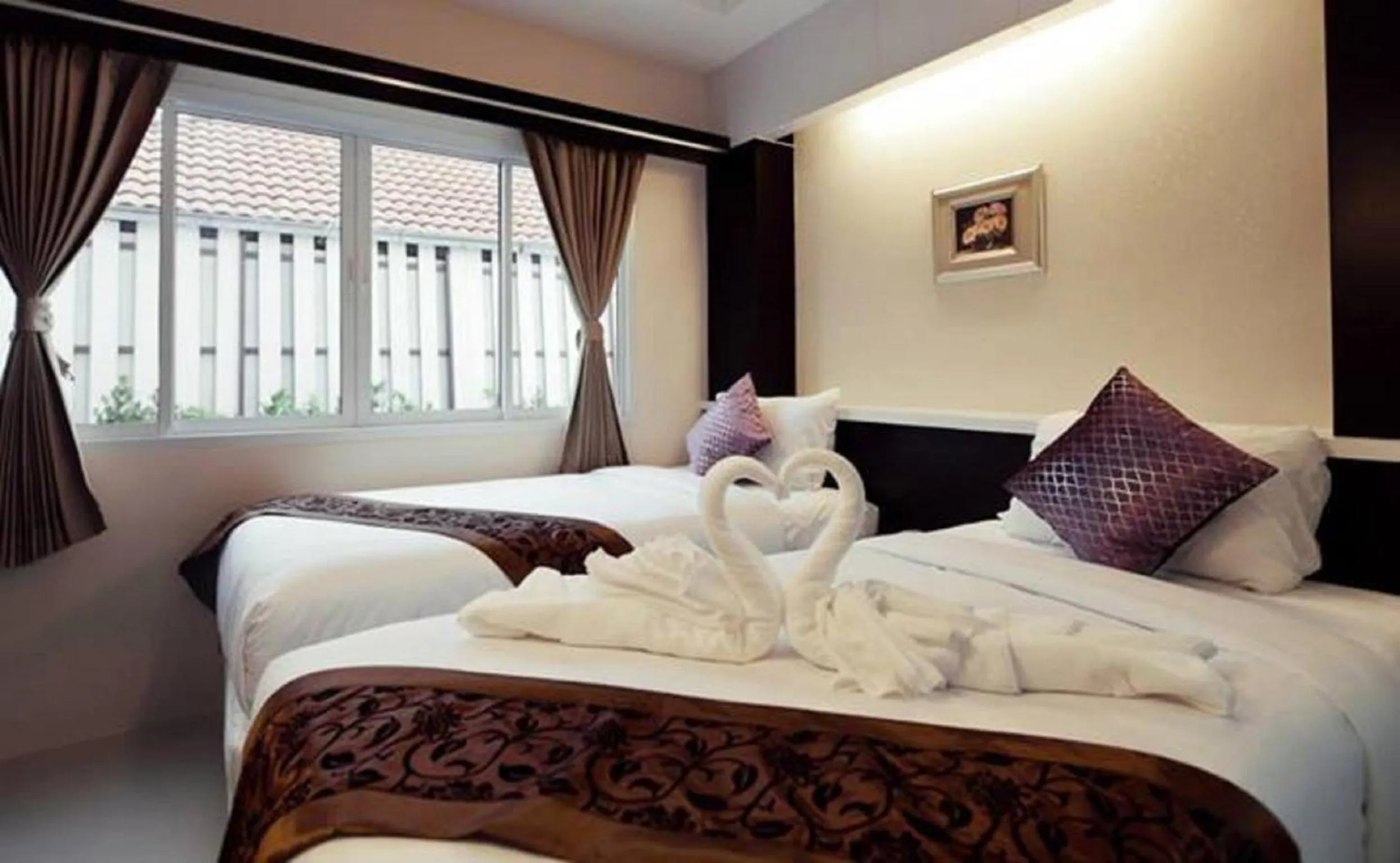 Bed in Excella Hotel