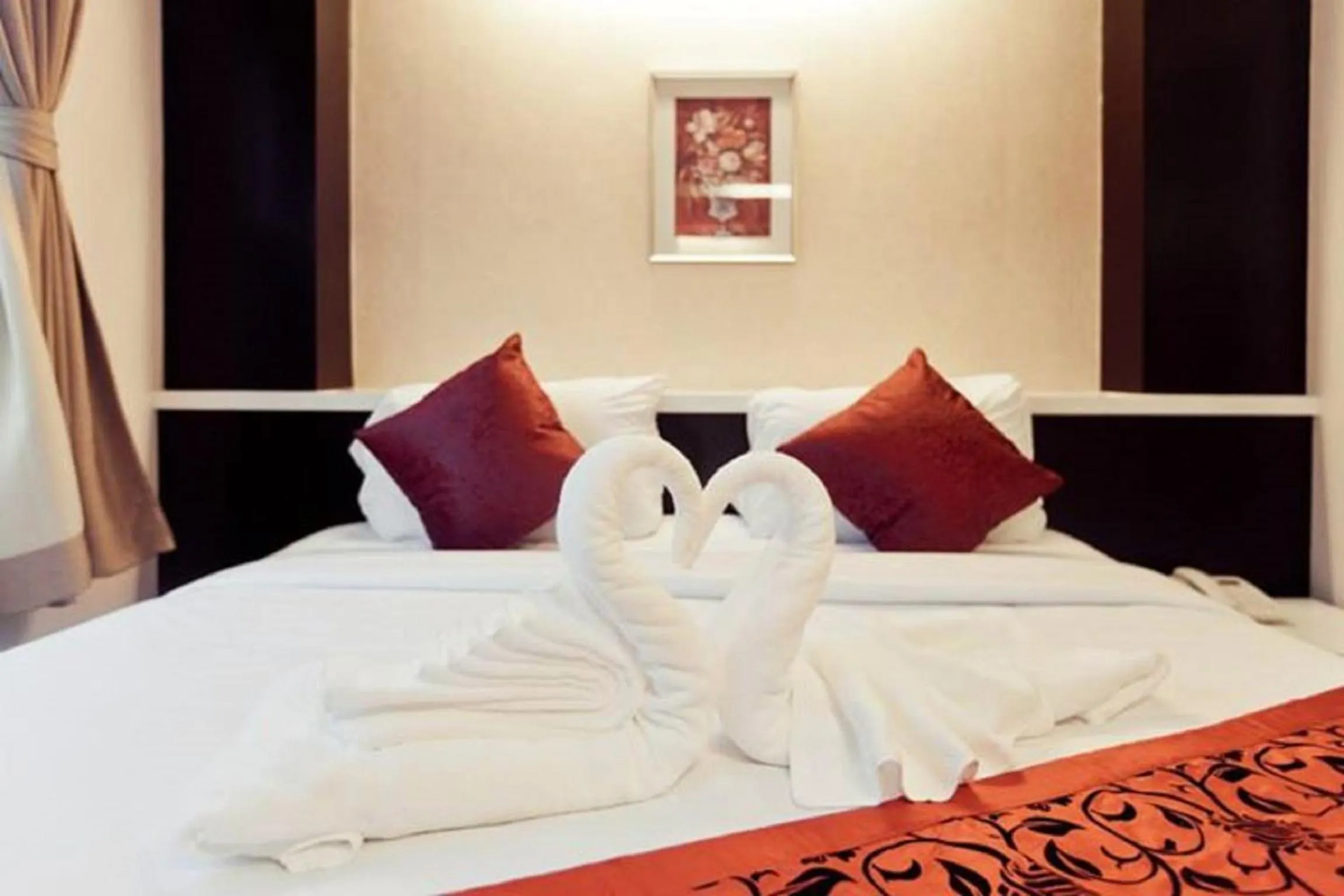 Bed in Excella Hotel