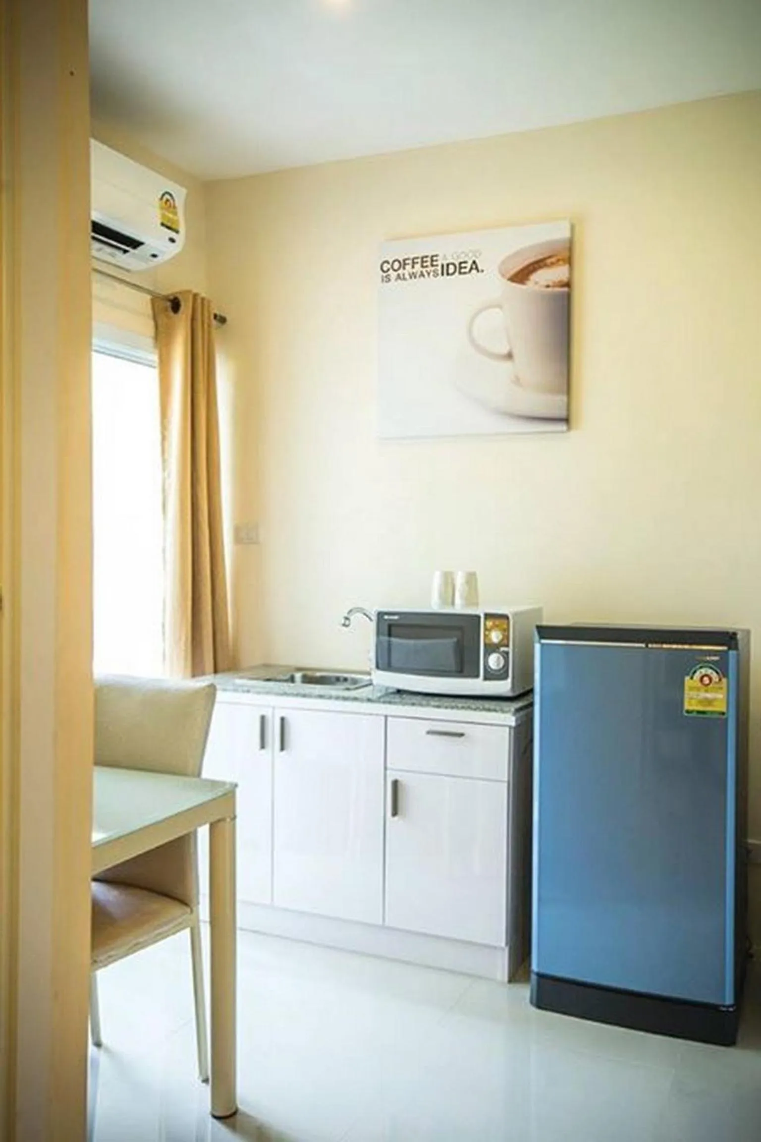Kitchen or kitchenette in Excella Hotel
