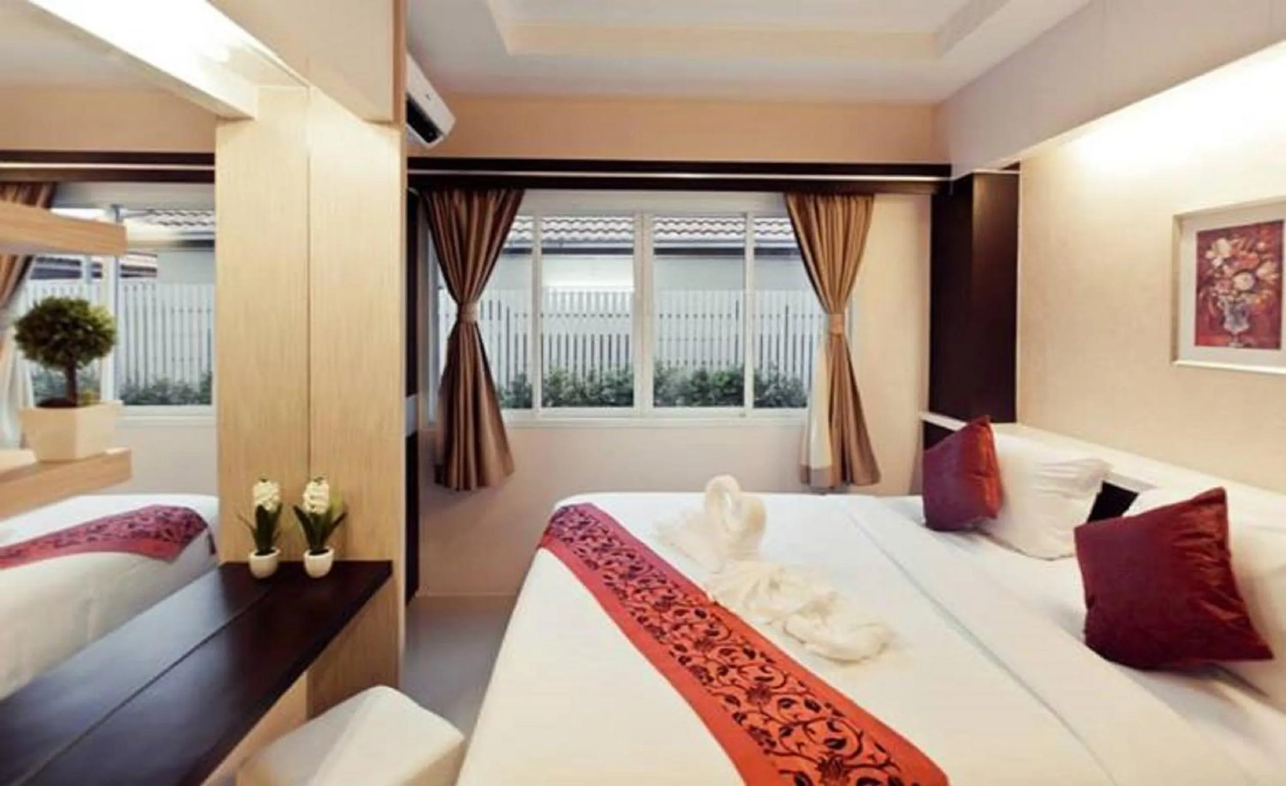 Bed in Excella Hotel