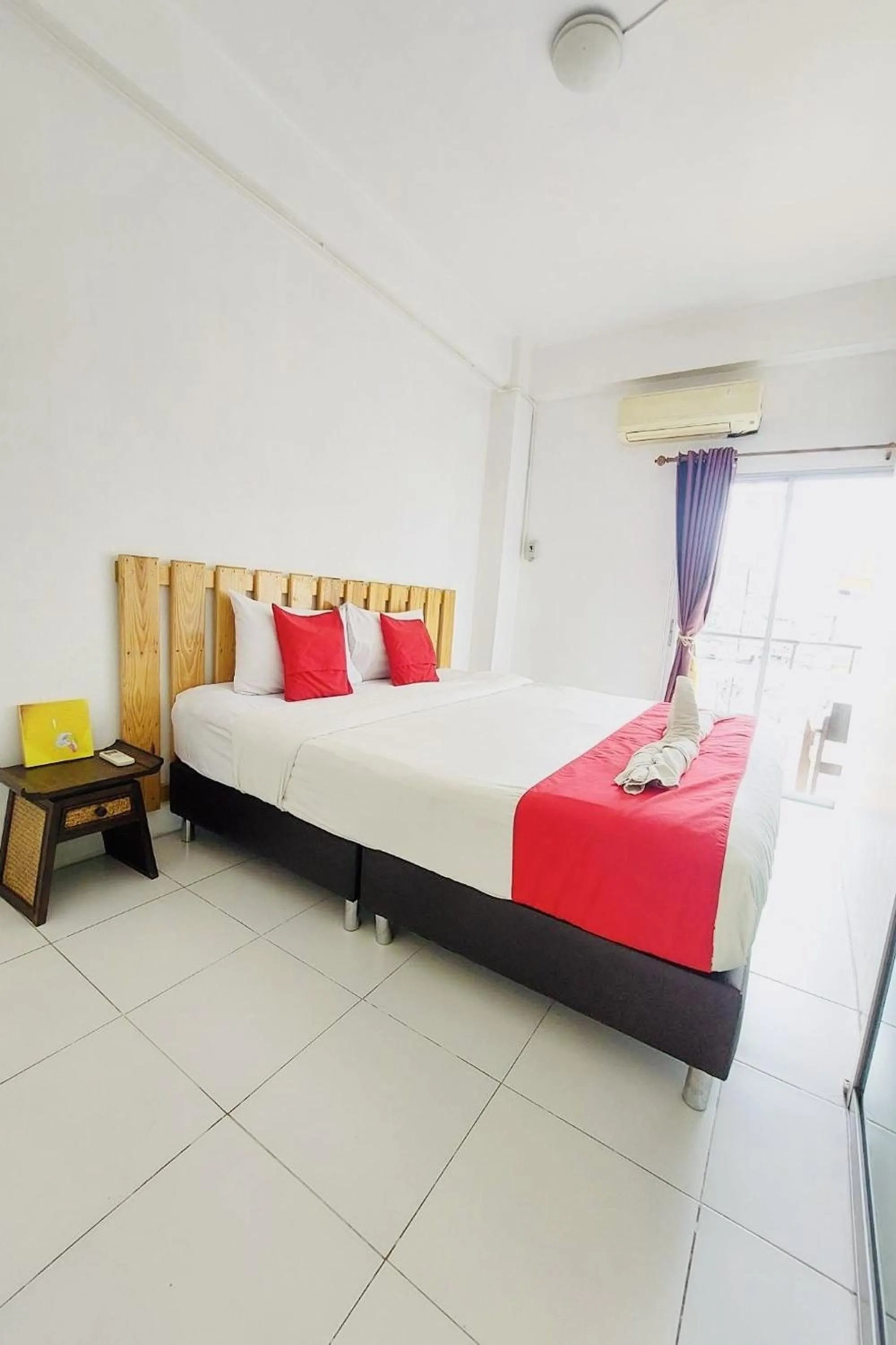 Bed in The Yak Cozy Chiang Mai