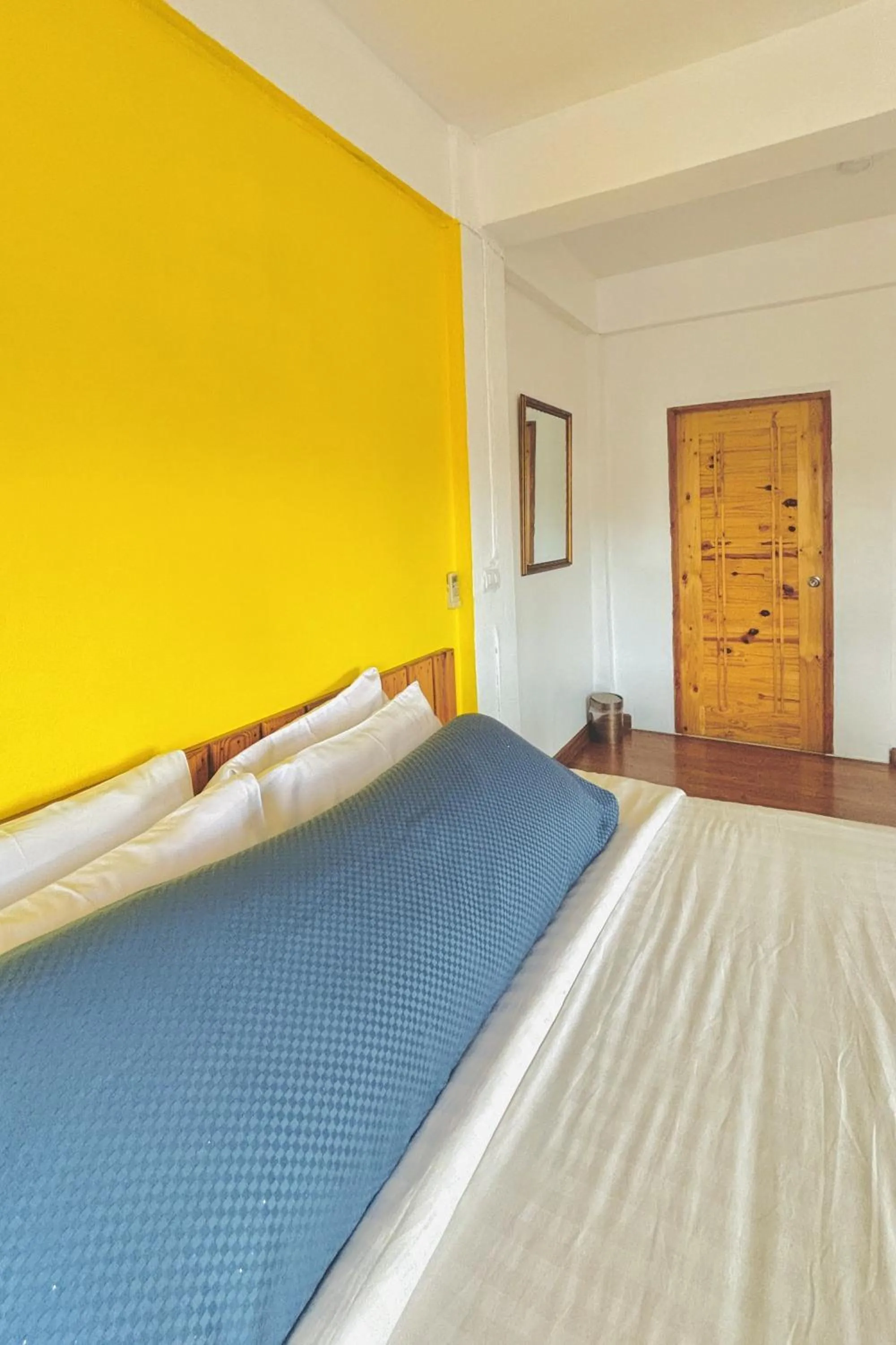 Bed in The Yak Cozy Chiang Mai