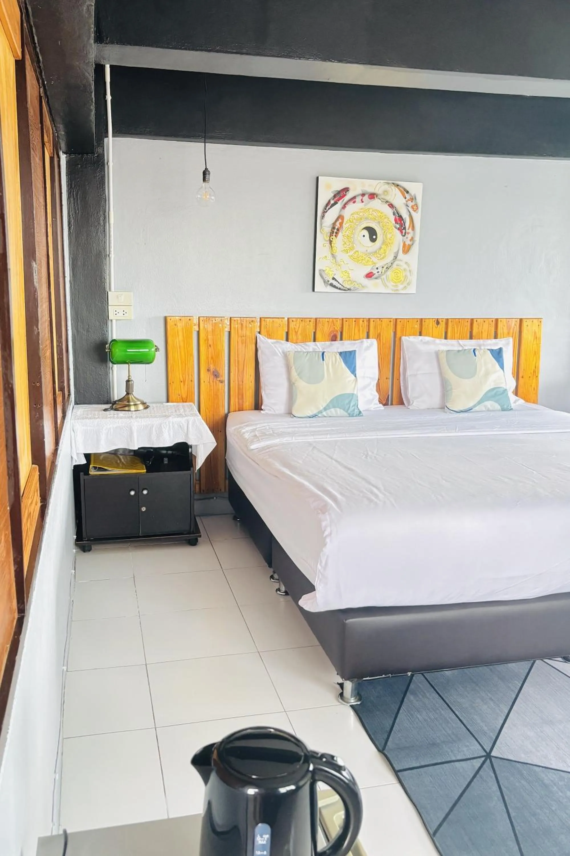 Bed in The Yak Cozy Chiang Mai