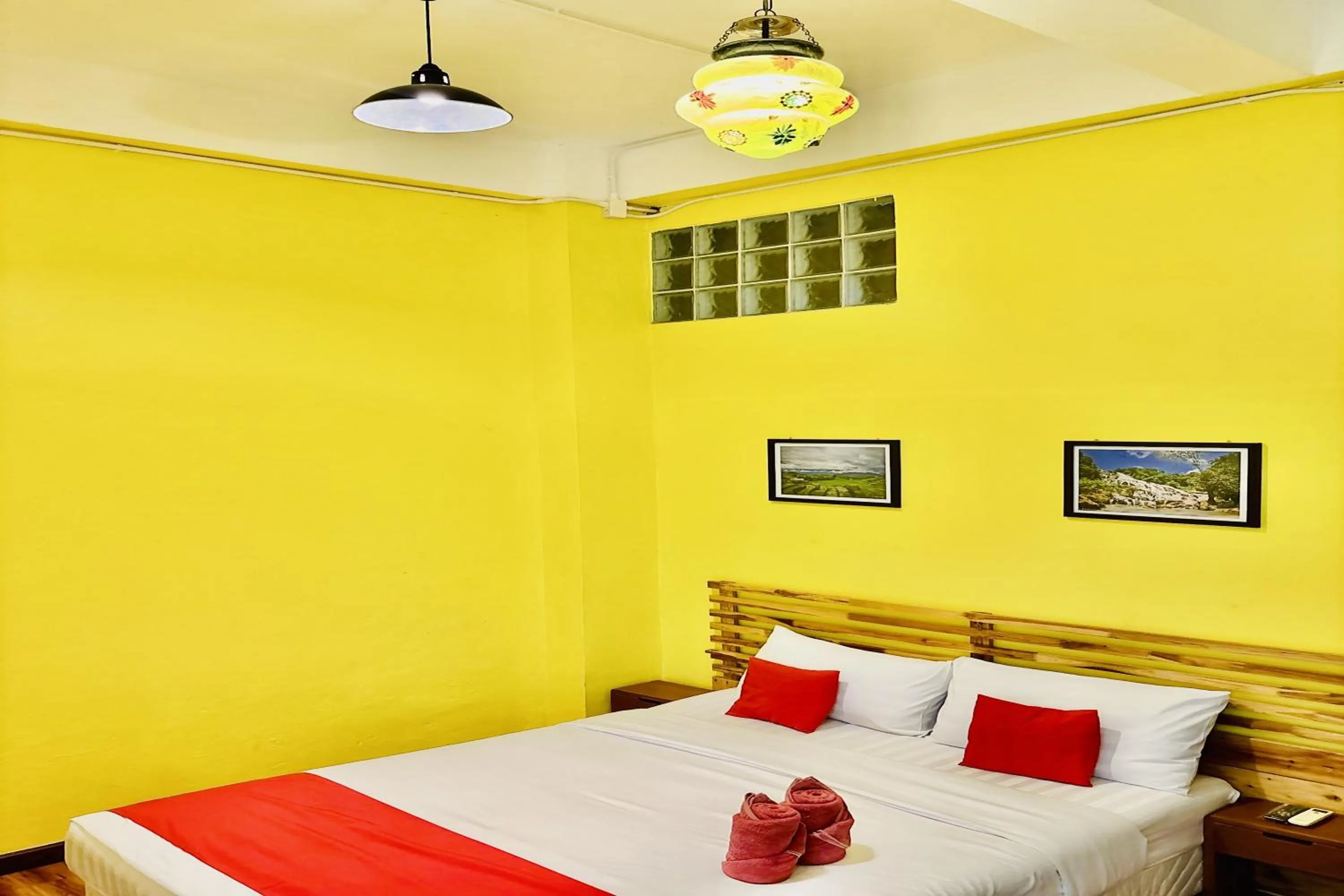 Bed in The Yak Cozy Chiang Mai