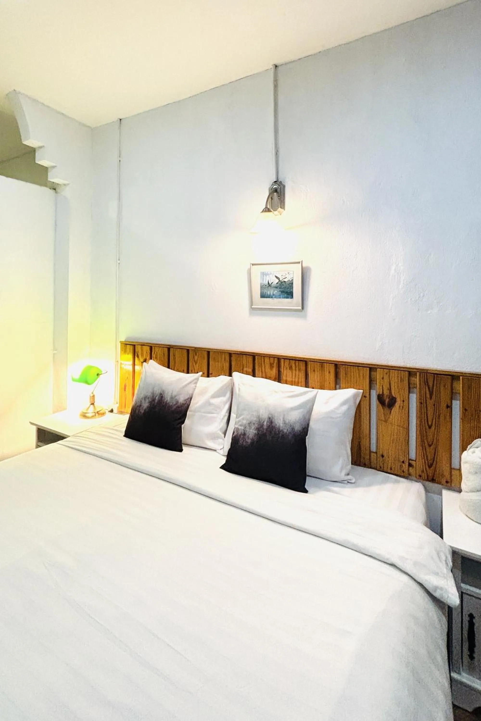 Bed in The Yak Cozy Chiang Mai