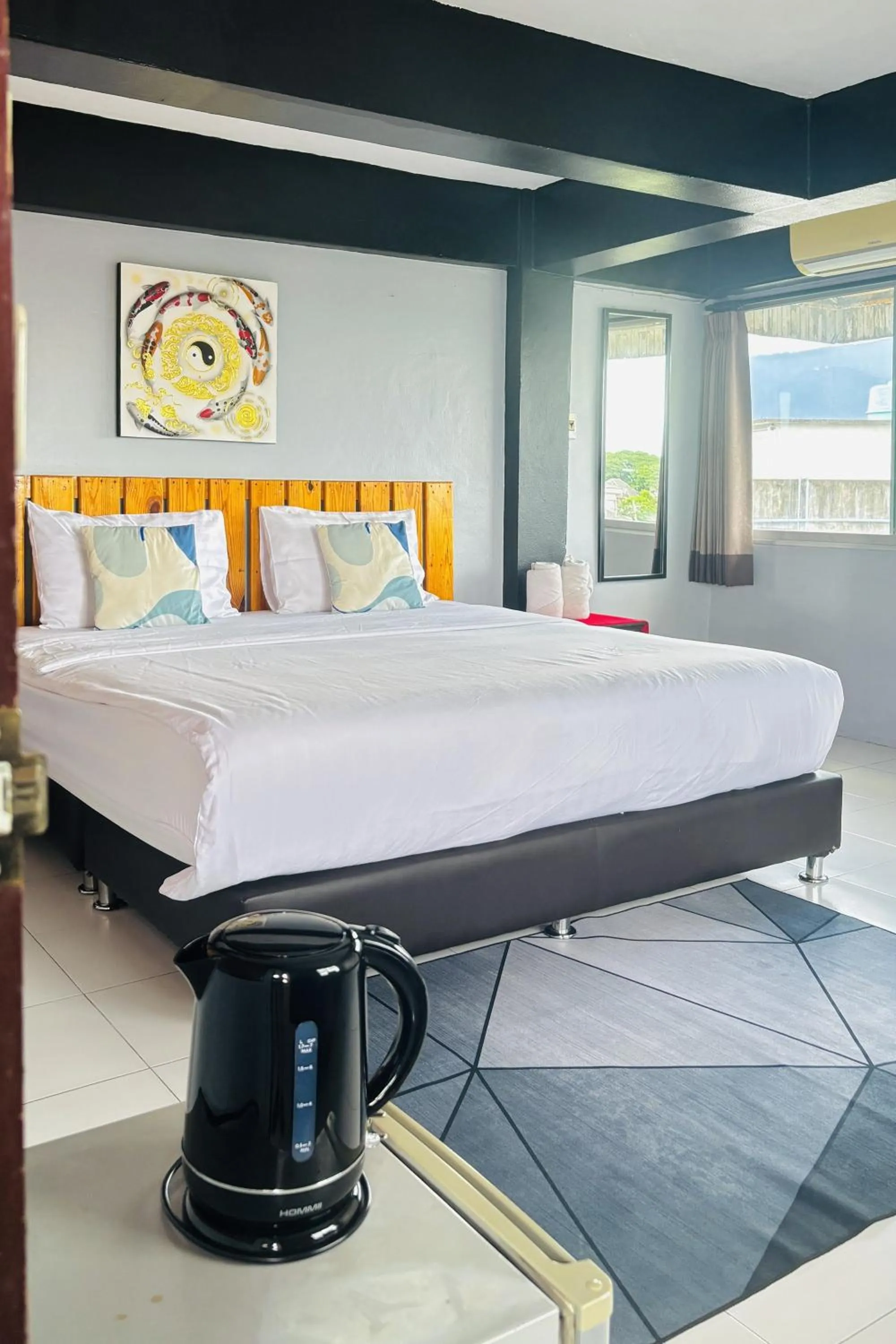 Bed in The Yak Cozy Chiang Mai