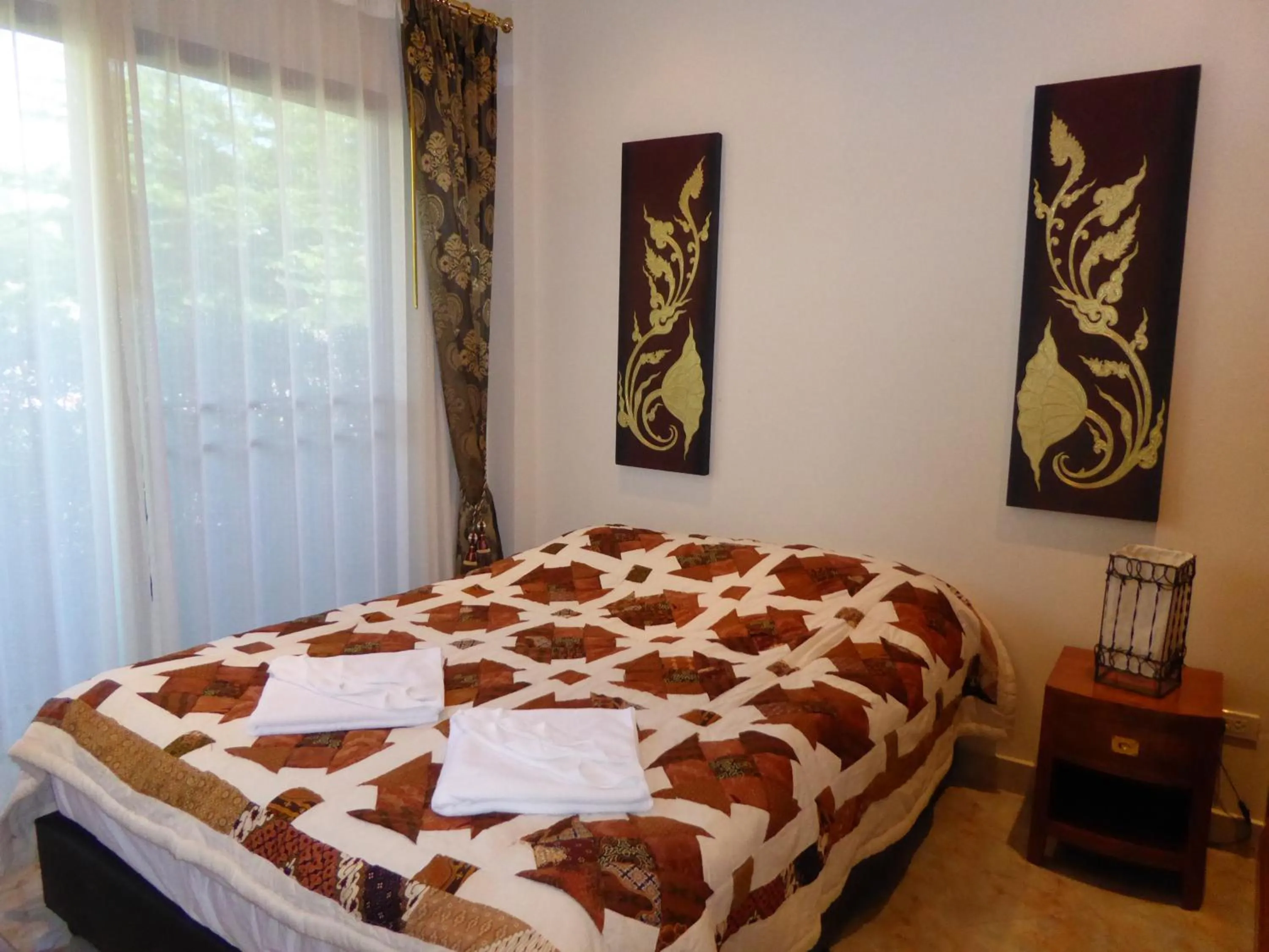 Bed in VIP Chain Resort Pool Villa