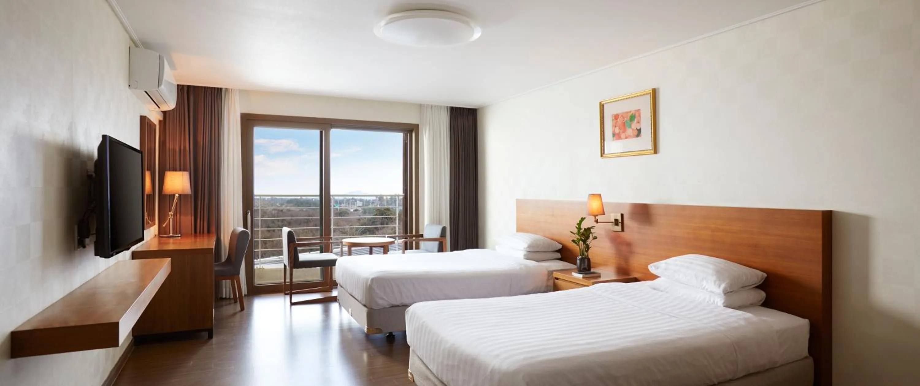 Bed in Jeju Aerospace Hotel