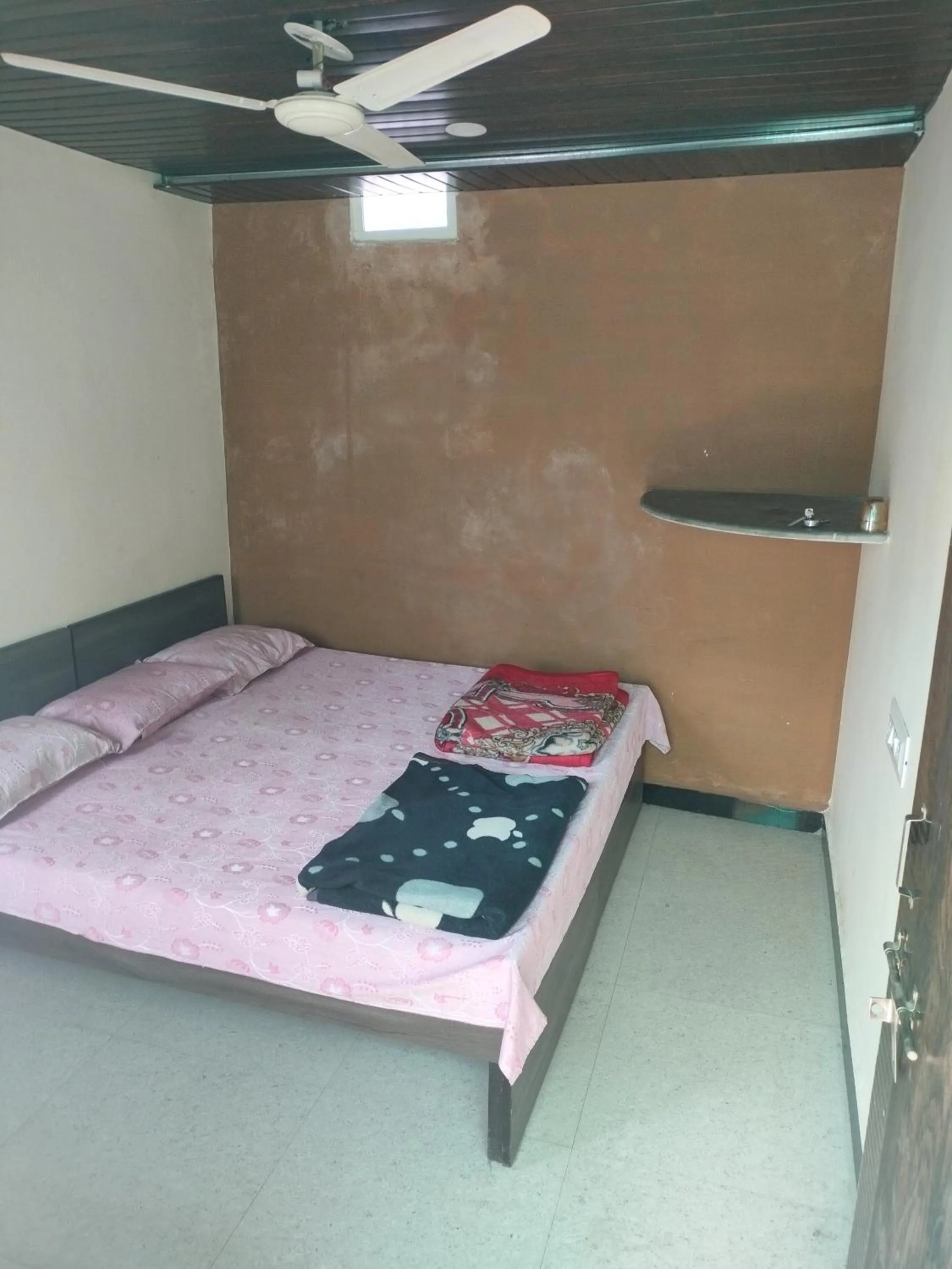 Bed in Kailash kuti Guest House