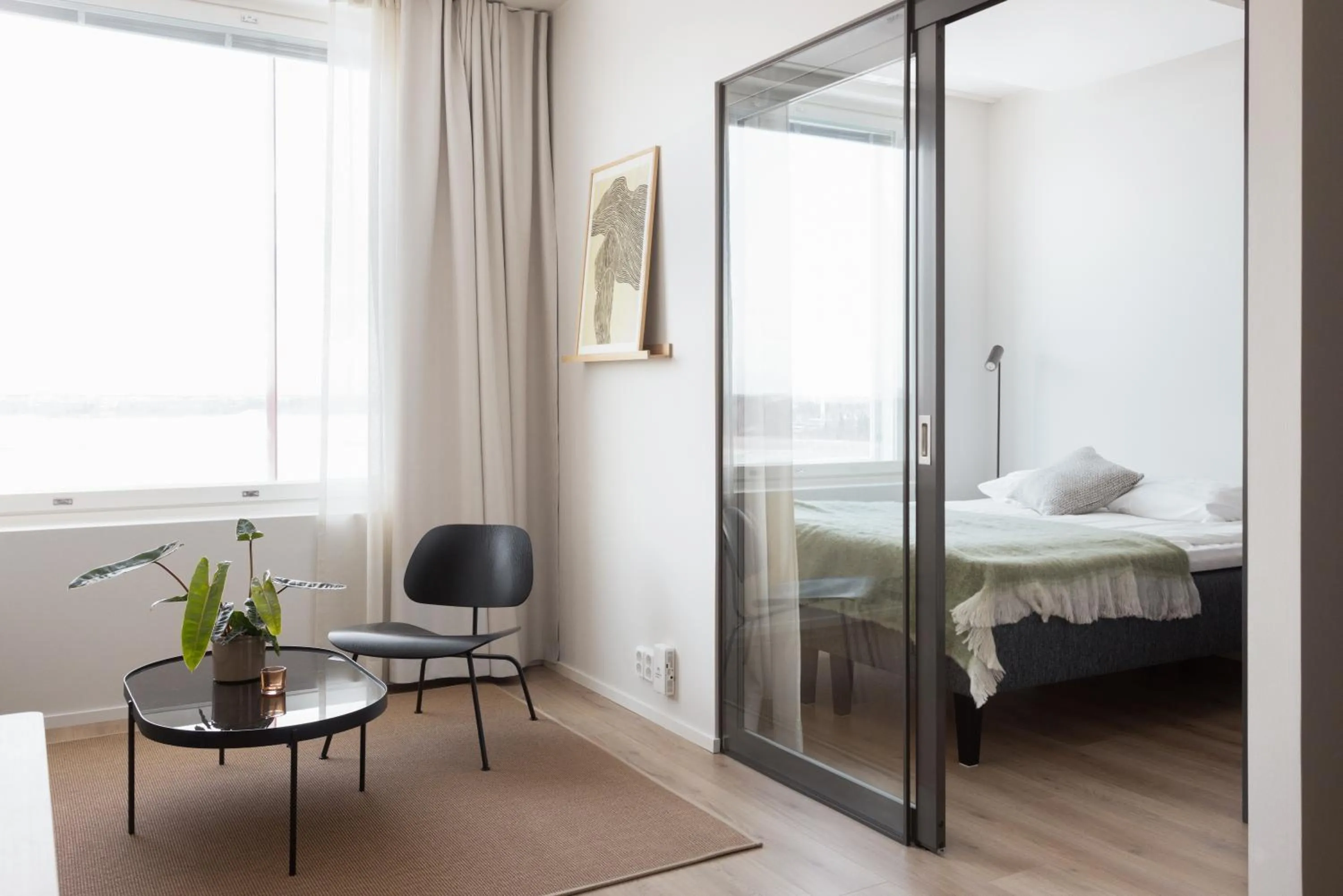 Seating area, Bed in Noli Otaniemi