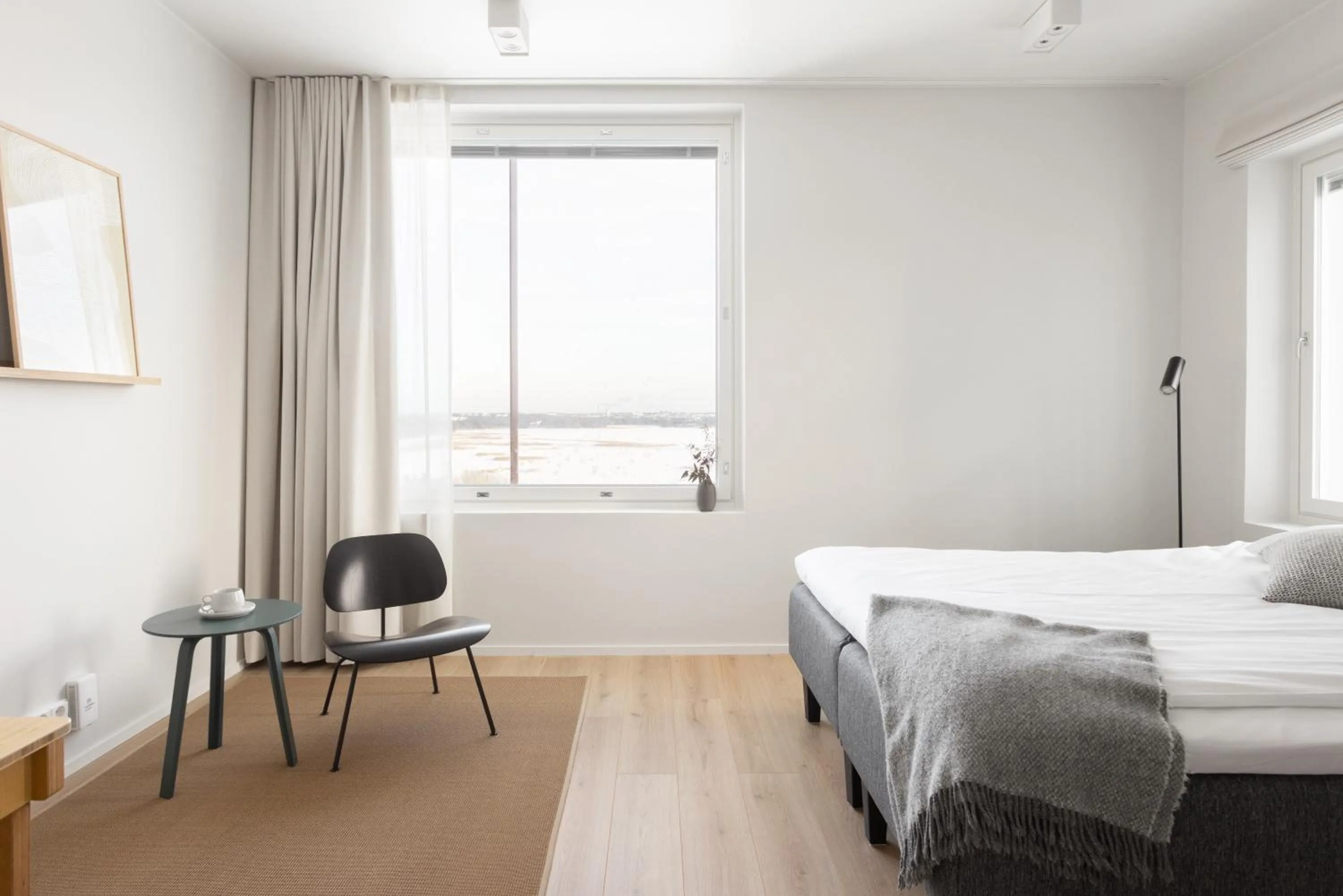 Seating area, Bed in Noli Otaniemi