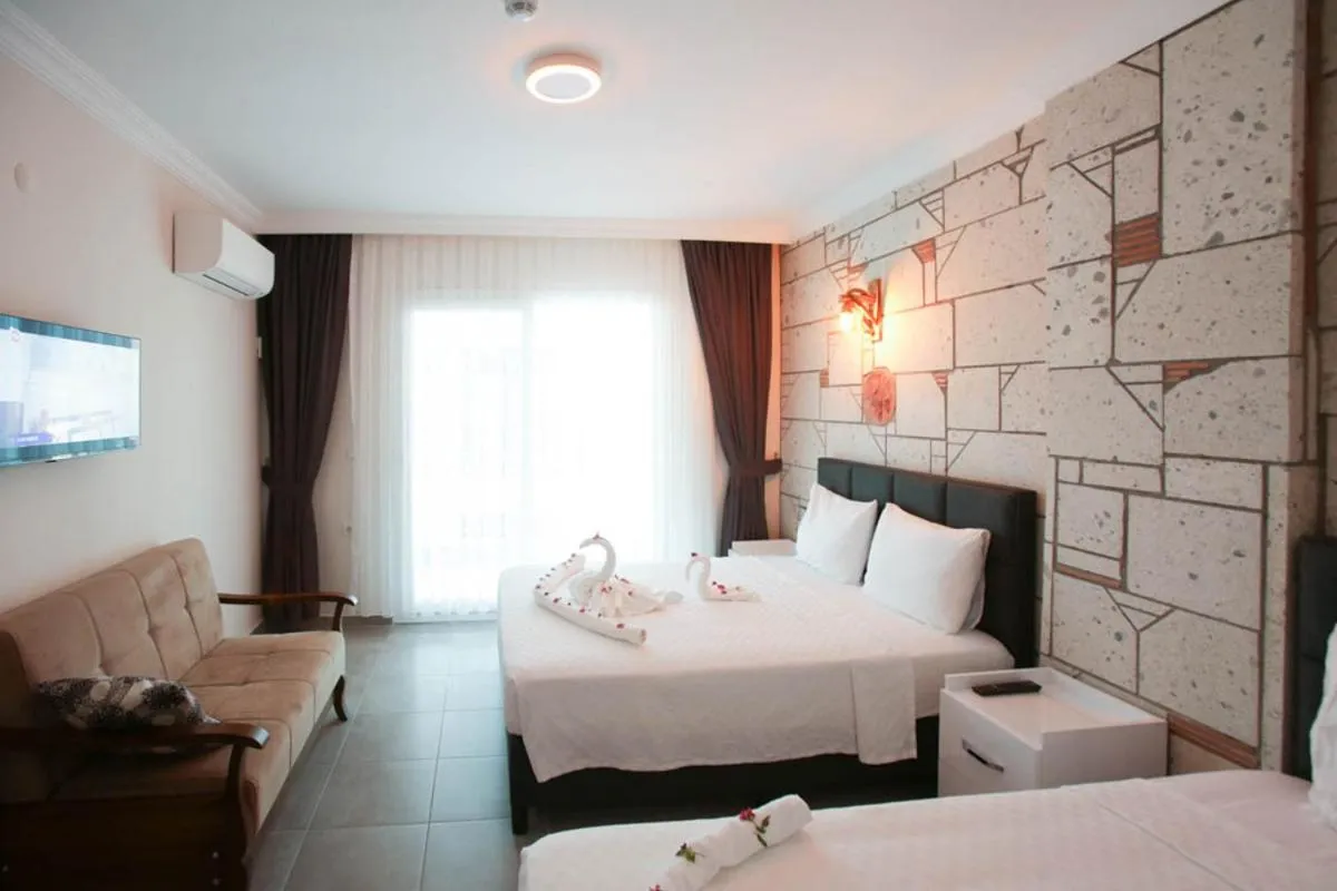 Bed in Lebedos Apart Hotel 1